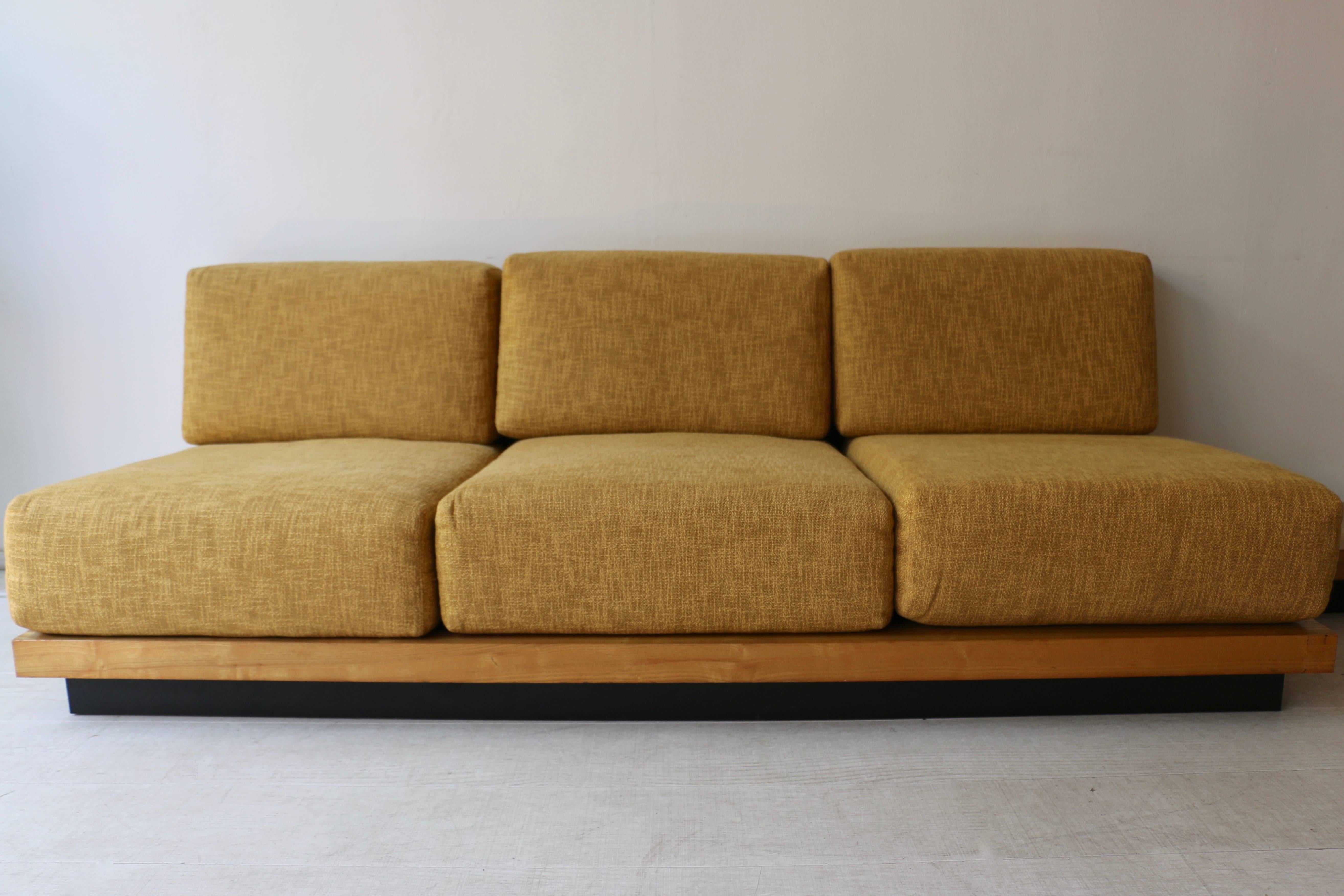 Gustave Gautier (1911-1980)
Unique piece deigned in 1961 for a villa in Cannes, France.
Three seats sofa in light wood veneer with yellow fabric cushions.