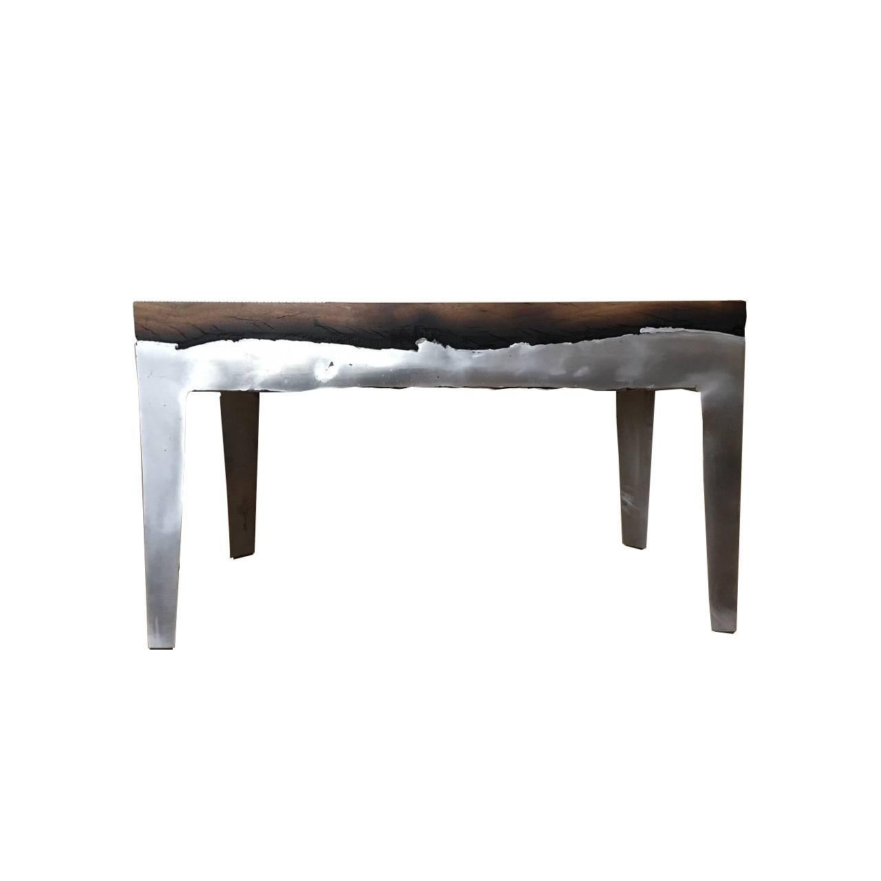 Hilla Shamia’s acclaimed wood casting furniture is made in a unique technique of casting aluminium or brass on natural wood. It seeks to capture the unpredictable and dramatic encounter between the natural elements of wood and metal. 

Wood