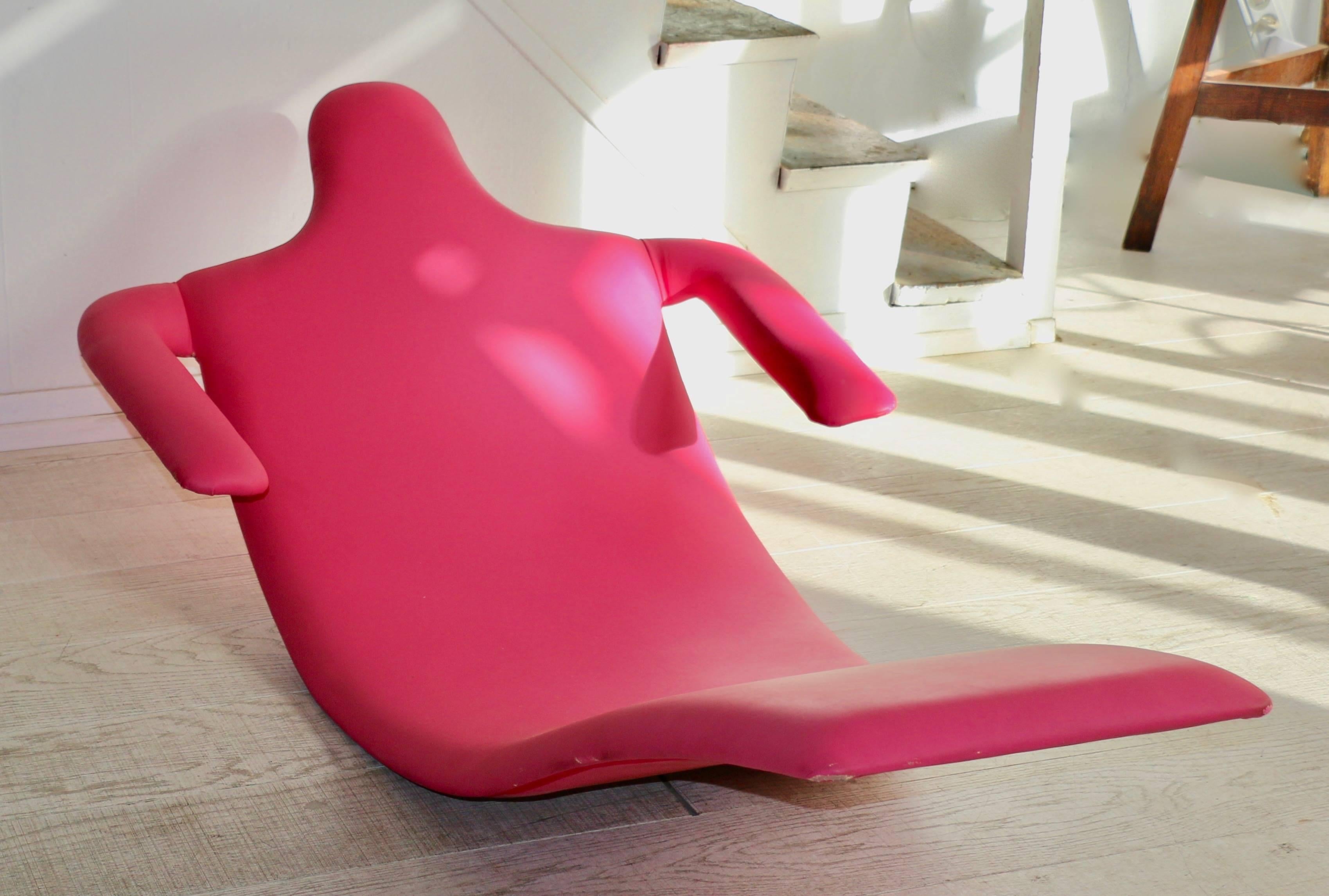 1990s amusing lounge chair with an anthropomorphic shape in pink skai.