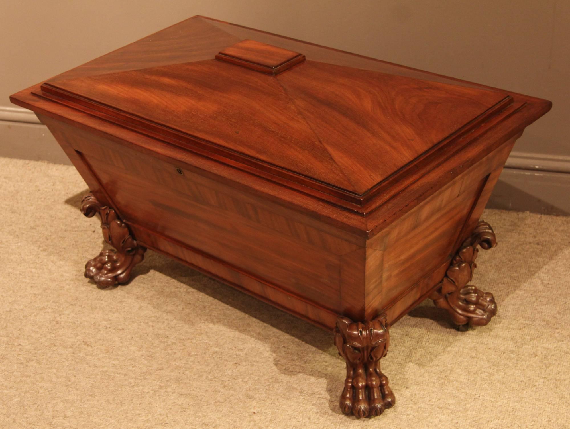 A fine quality Regency period mahogany sarcophagus wine cooler with large hairy paw feet, circa 1815.

 
All of the items that we advertise for sale have been as accurately described as possible and are in excellent condition, unless otherwise