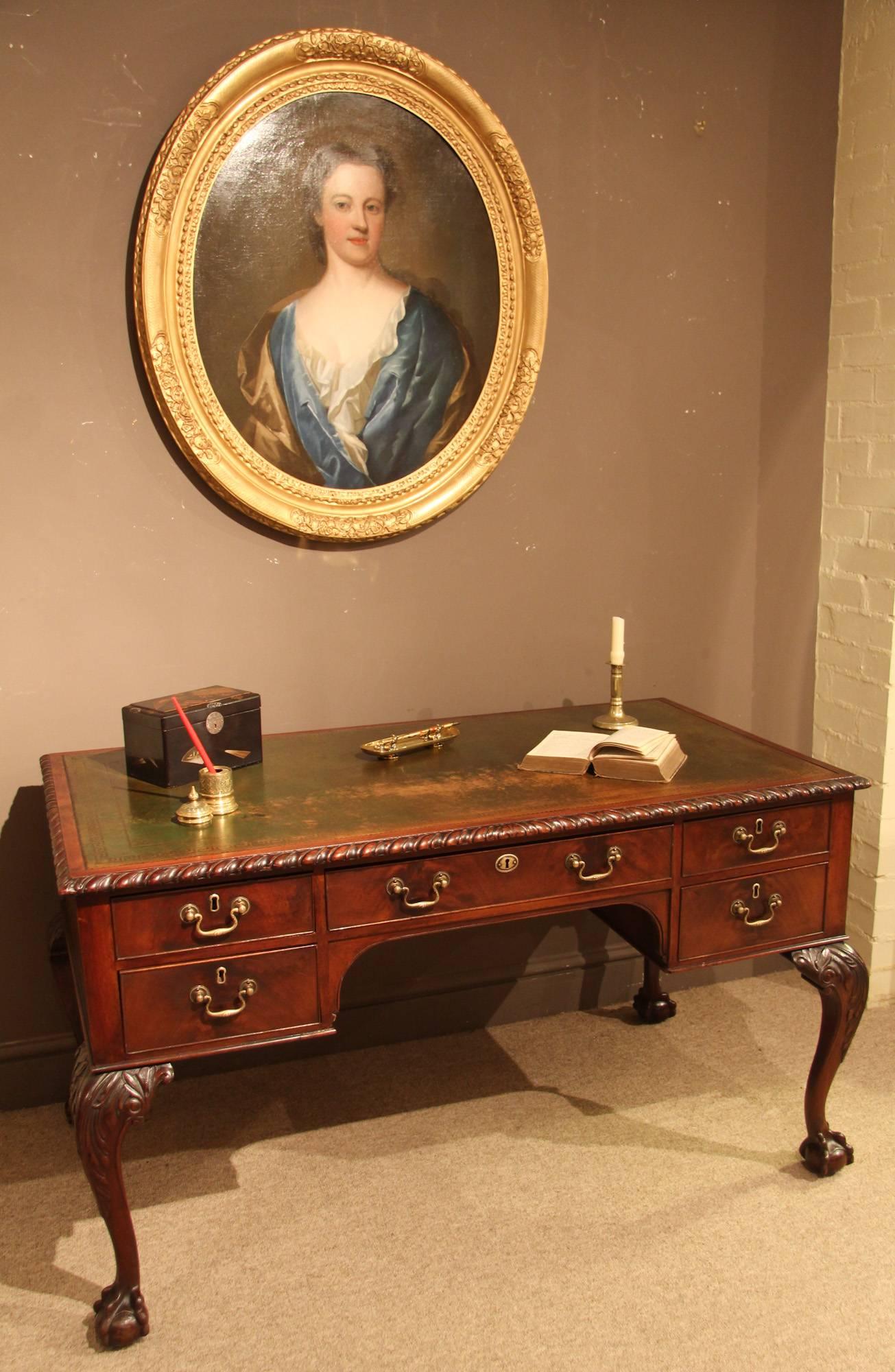 Mahogany George III style writing desk with tooled leather insert, cabriole legs.  Ball and claw feet, early 20th century.

Please note – this is only available to view by appointment only.

All of the items that we advertise for sale have been
