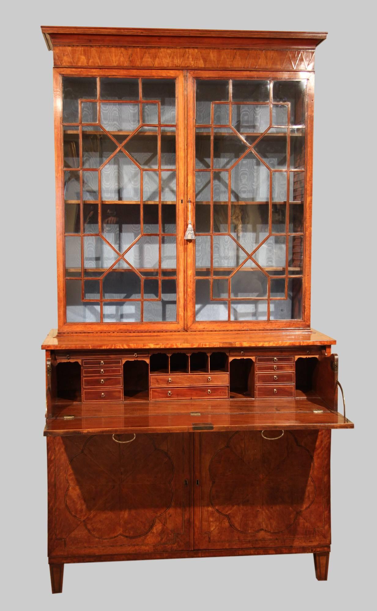 A late 18th century West-Indies satinwood secretaire bookcase, circa 1790.

All of the items that we advertise for sale have been as accurately described as possible and are in excellent condition, unless otherwise stated. Please note that we are