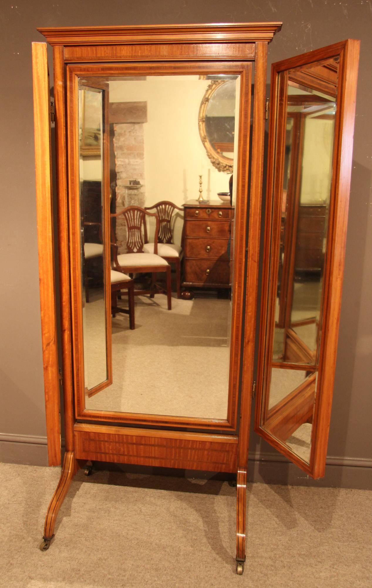 Superb quality satinwood and ebony string Sheraton design triple plate cheval mirror, circa 1900.

All of the items that we advertise for sale have been as accurately described as possible and are in excellent condition, unless otherwise stated.