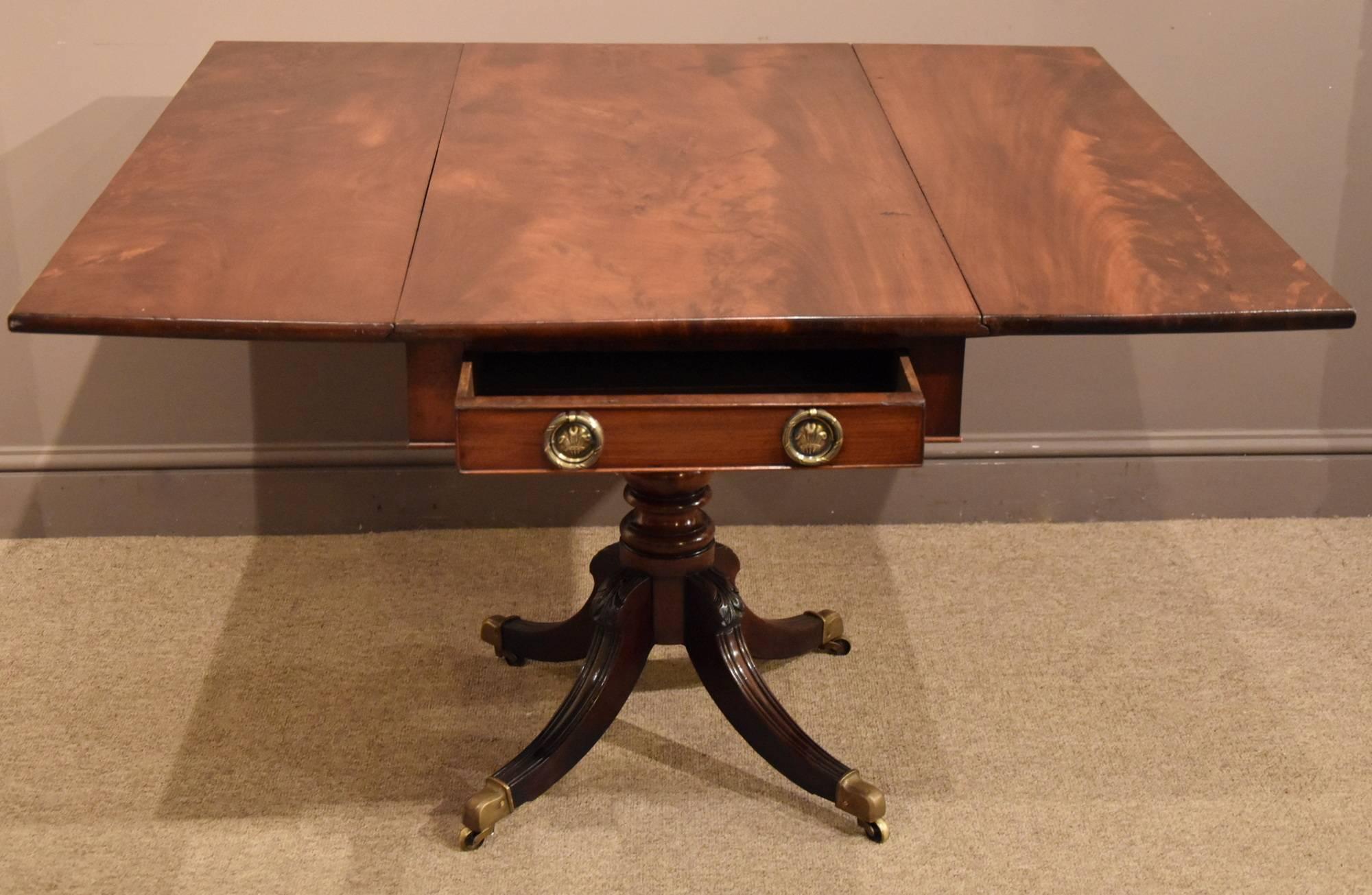 An elegant Regency period mahogany pembroke table with flamed timber. The piece with two drawers on turned balaster base played legs terminating in brass casters.

All of the items that we advertise for sale have been as accurately described as