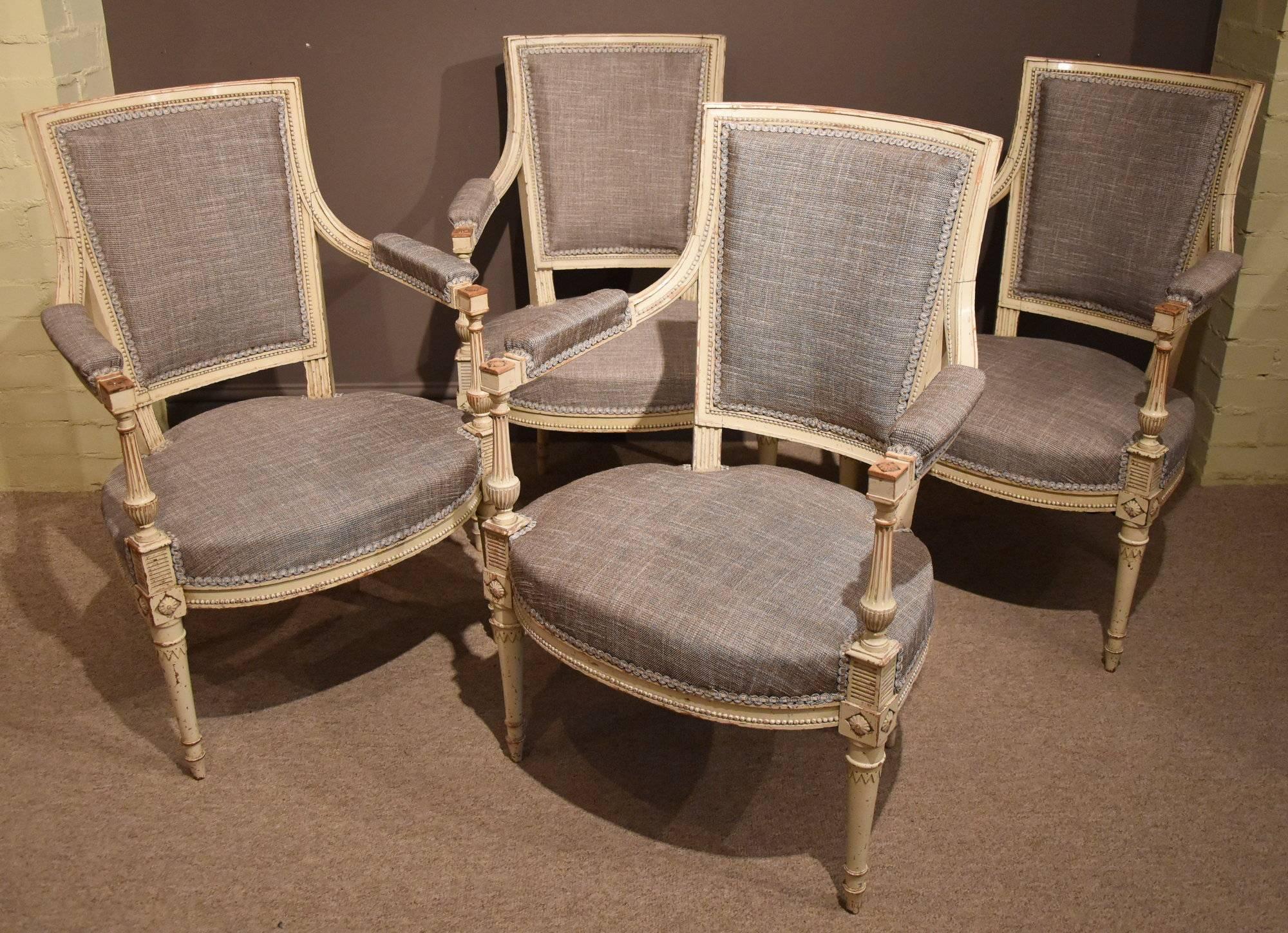 Four French Directoire style armchairs with original paint.

Height 35.5" 89cm.
Width 23.5" 60cm.
Depth 19.5" 48cm.

All of the items that we advertise for sale have been as accurately described as possible and are in excellent