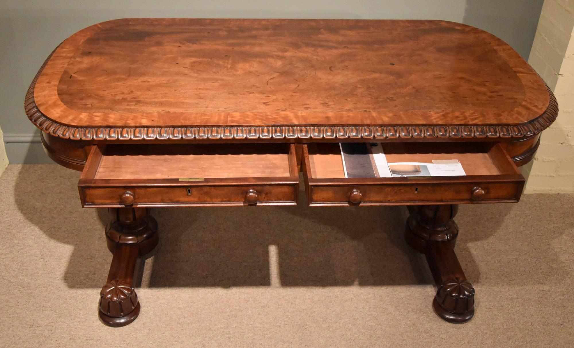 This magnificent table was made by William and Gibton and stamped in the drawer 'Williams and Gibton 14116. The highly successful Dublin firm of Mack, Williams and Gibton whose furniture was often stamped with a series of number and sometimes also