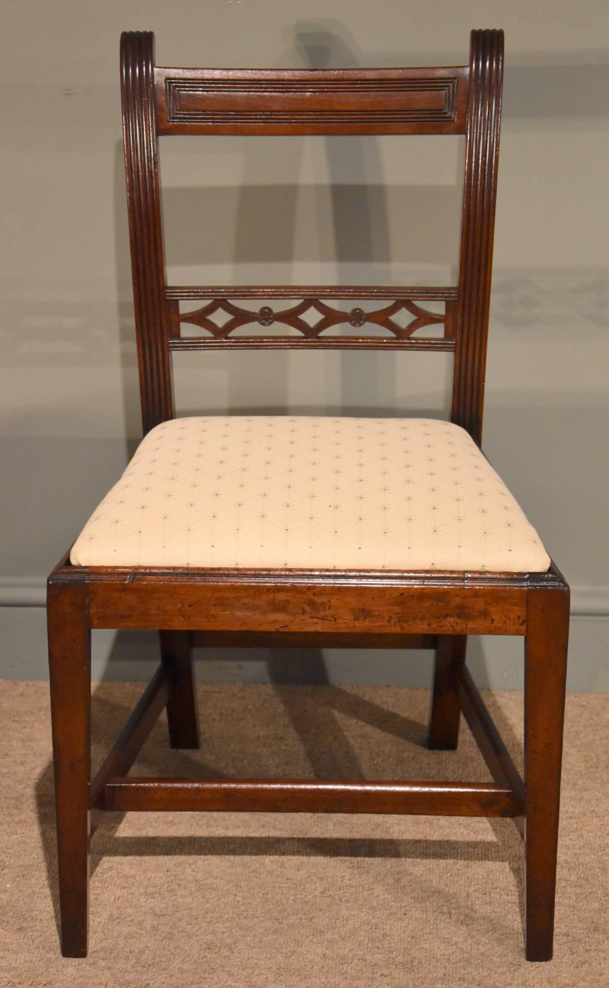 A good set of six Regency period mahogany lattice back reeded dining chairs. The chairs with drop in seats and stretchers

Dimensions
Height 35