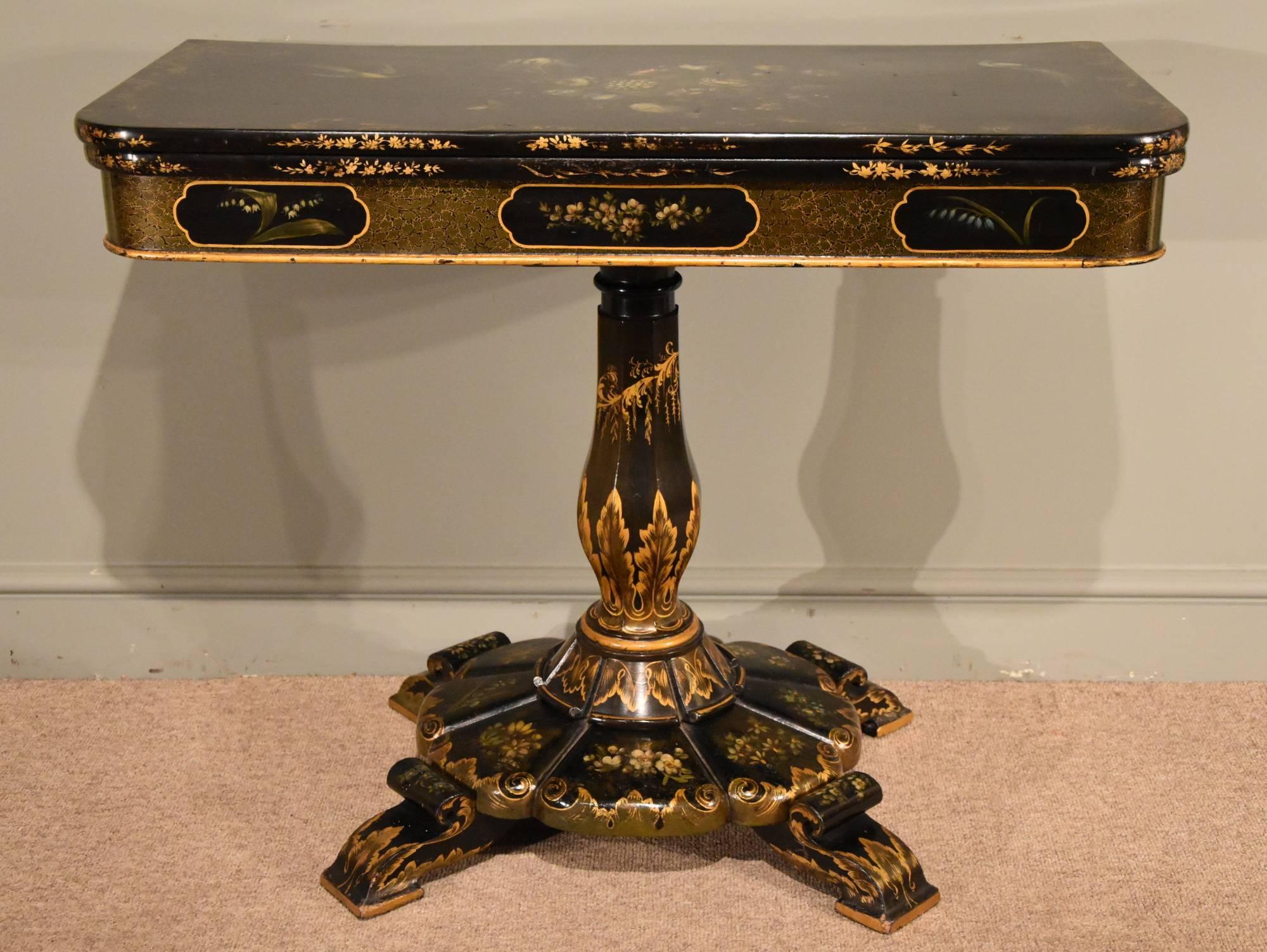 A superb William IV Japanned card table decorated with exotic birds and flowers. Probably made by a top cabinet workshop with specialist painters and gilders. The top is centred by a bouquet of blooms flanked by two birds of paradise the frieze has