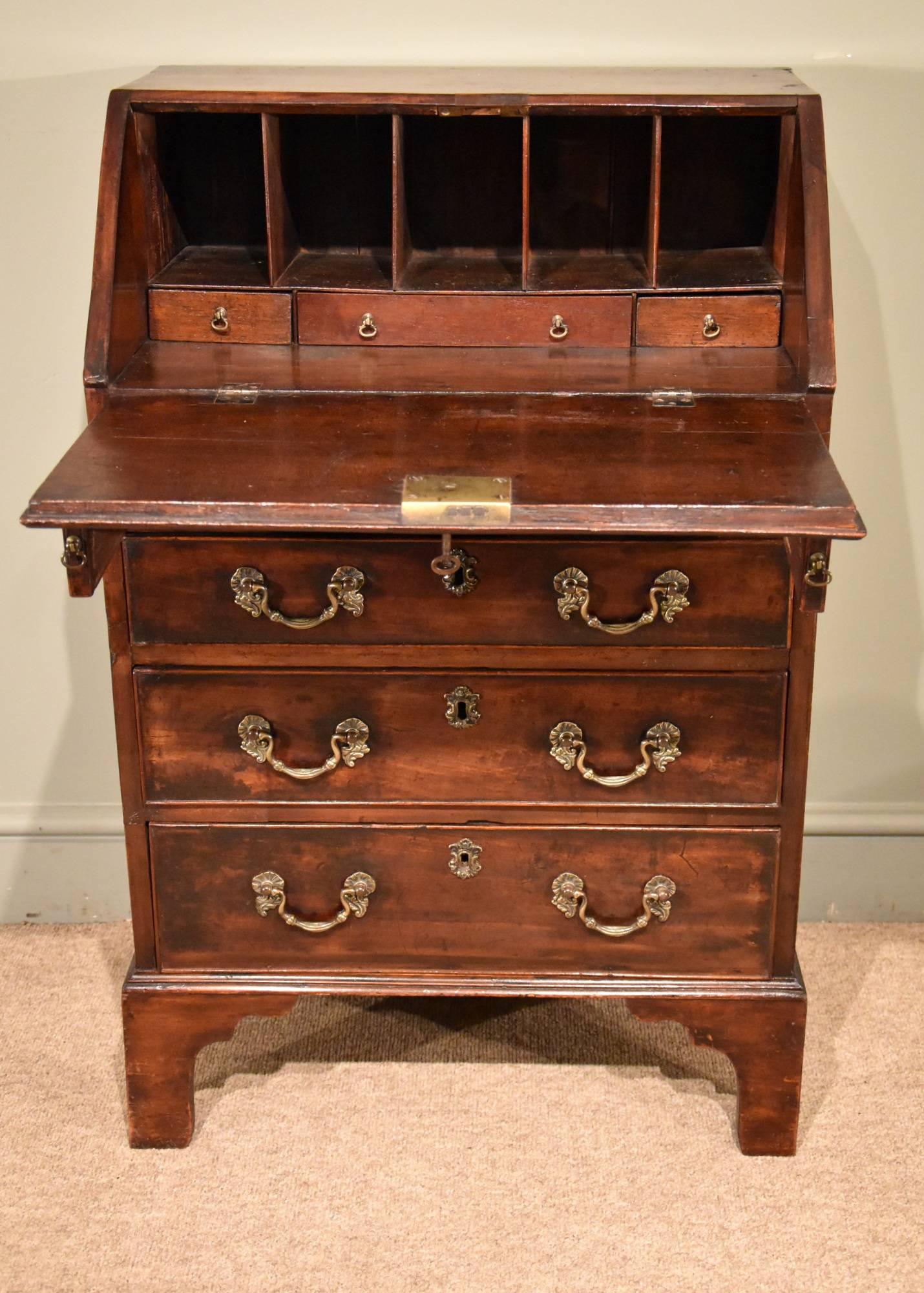 A Diminutive George III mahogany bureau of superb color only 24 wide 

Dimensions:
Height 37
