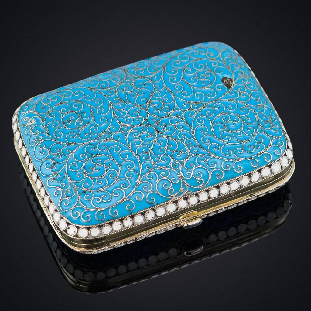 Description:

Antique 19th century imperial Russian parcel-gilt solid silver and cloisonné' enamel cigarette case, all of the surface enameled in opaque blue with pertruding filigree floral design and a white bead boarder around the edge. Engraved