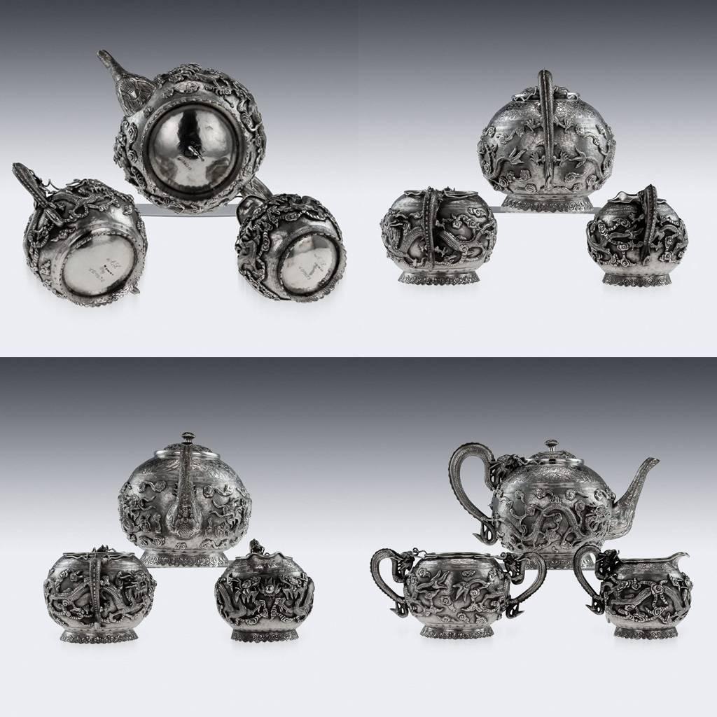 Description: 

Antique 19th century Chinese export solid silver three-piece tea set, comprising of teapot, sugar bowl and milk jug, each spherical body is beautifully applied with dragons chasing the flaming pearl of wisdom, hammered surface, each