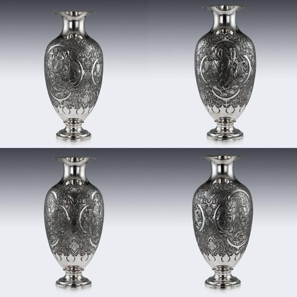 Description

Antique 20th century Persian pair of massive solid silver vases, impressively large and magnificent, each body of baluster form, profusely repoussed' decorated with different scenes and floral motifs on a finely tooled background.