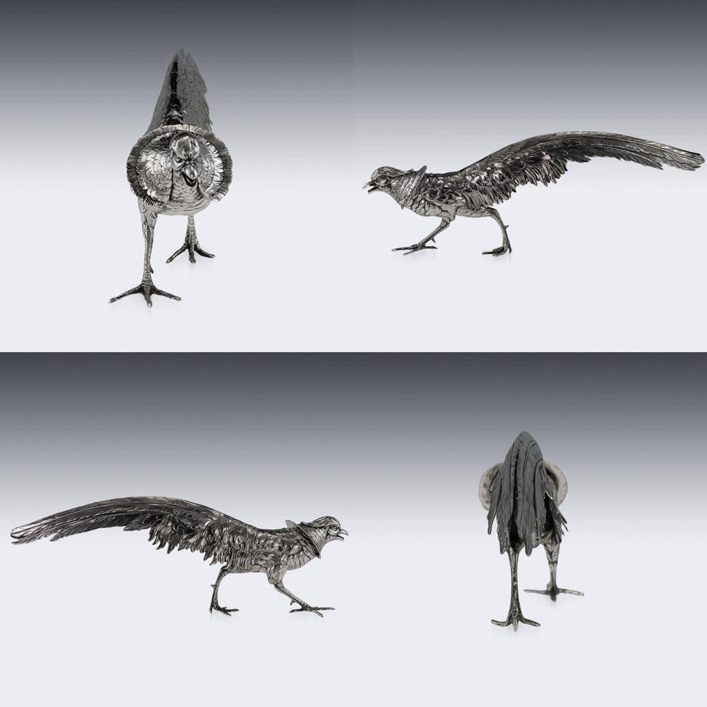 Description: 

Antique early-20th century German Hanau Solid Silver pair of large table ornaments modelled as pheasants. Each statue is very naturalistic and well-refined, perfect to use as a table or fireplace ornament. The male pheasant's head
