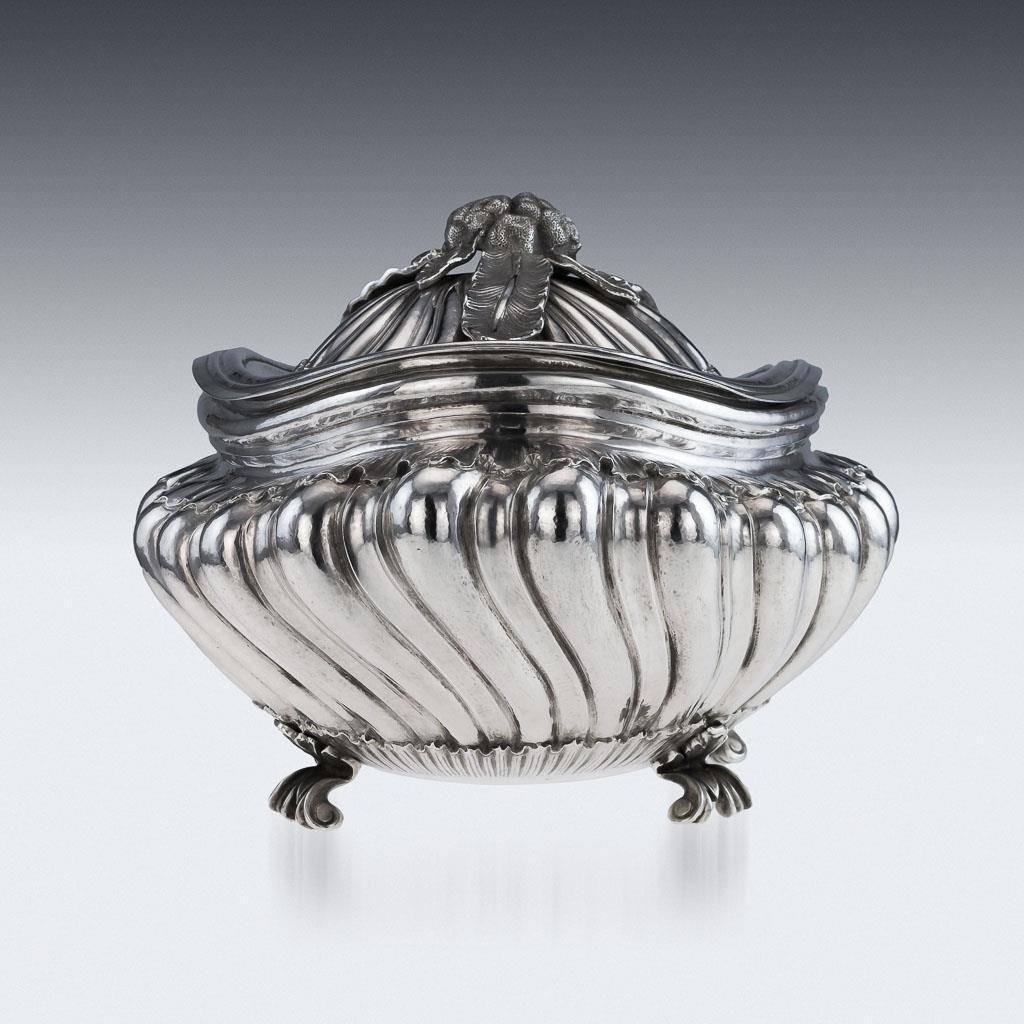 Stunning 20th century Italian solid silver soup tureen and cover, magnificent size and weight, oval form on four cast acanthus leaf scroll feet, the domed cover with organic decoration, the top applied with a large finial, realistically modeled as a