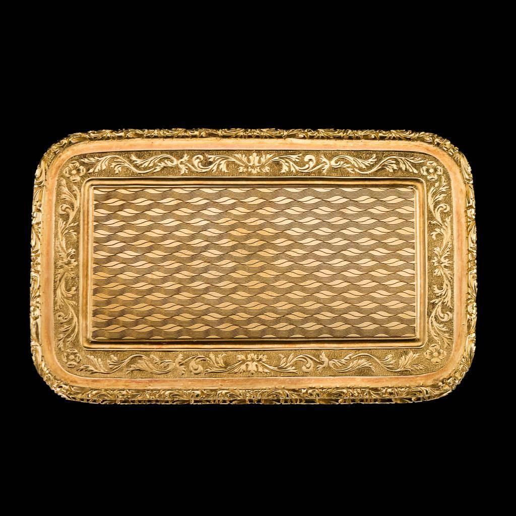 Antique 19th century French 18-karat solid gold snuff box, of rectangular form, the hinged engine turned covers beautifully engraved with floral motifs around the sides. The edges applied with bands of garlands and floral boarder. The box is very