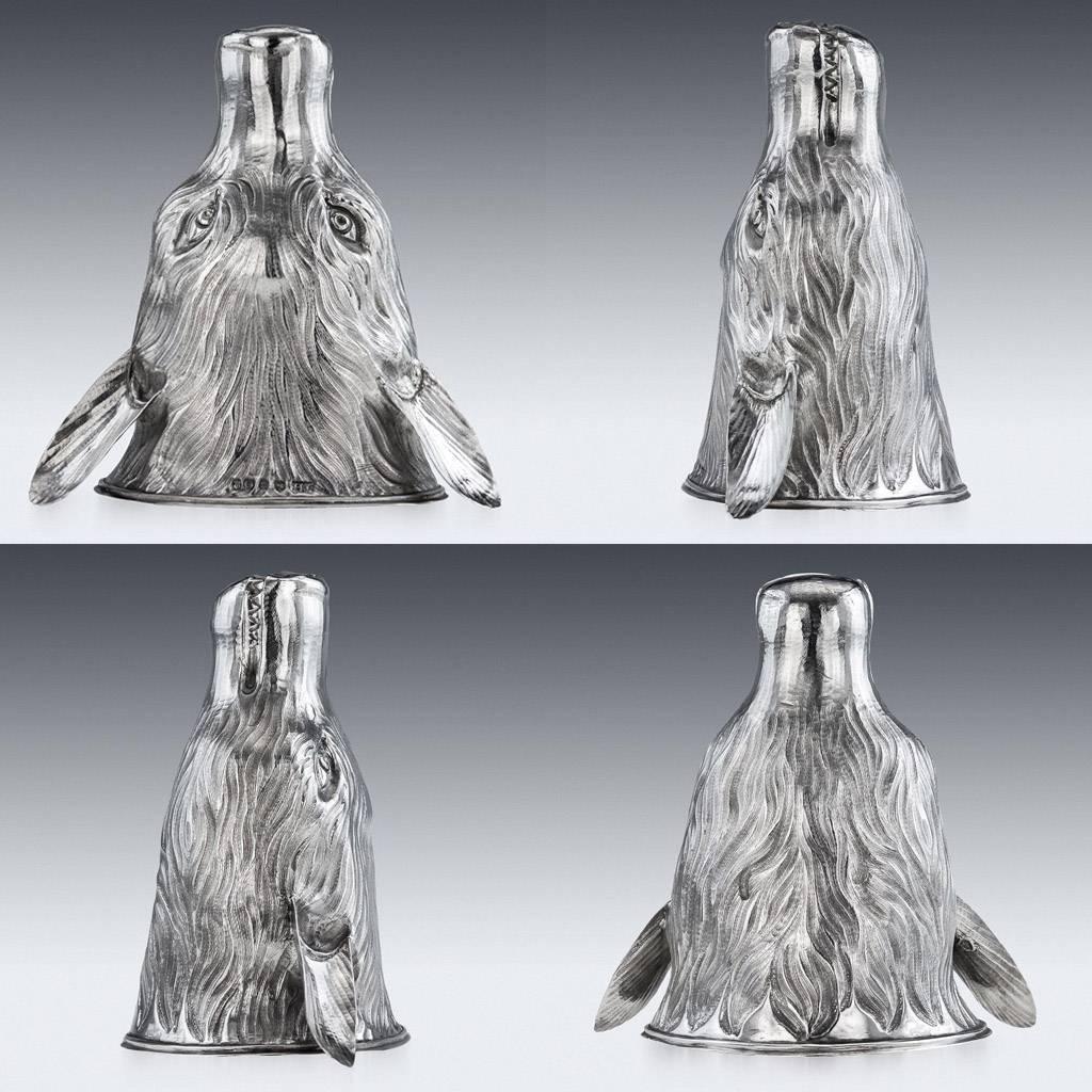 Antique early 19th century Georgian solid silver stirrup cup, beautifully modelled as a snarling fox's mask, realistically chased with fur. Georgian stirrup cups modelled as foxes are extremely rare and sought after.

Hallmarked English silver