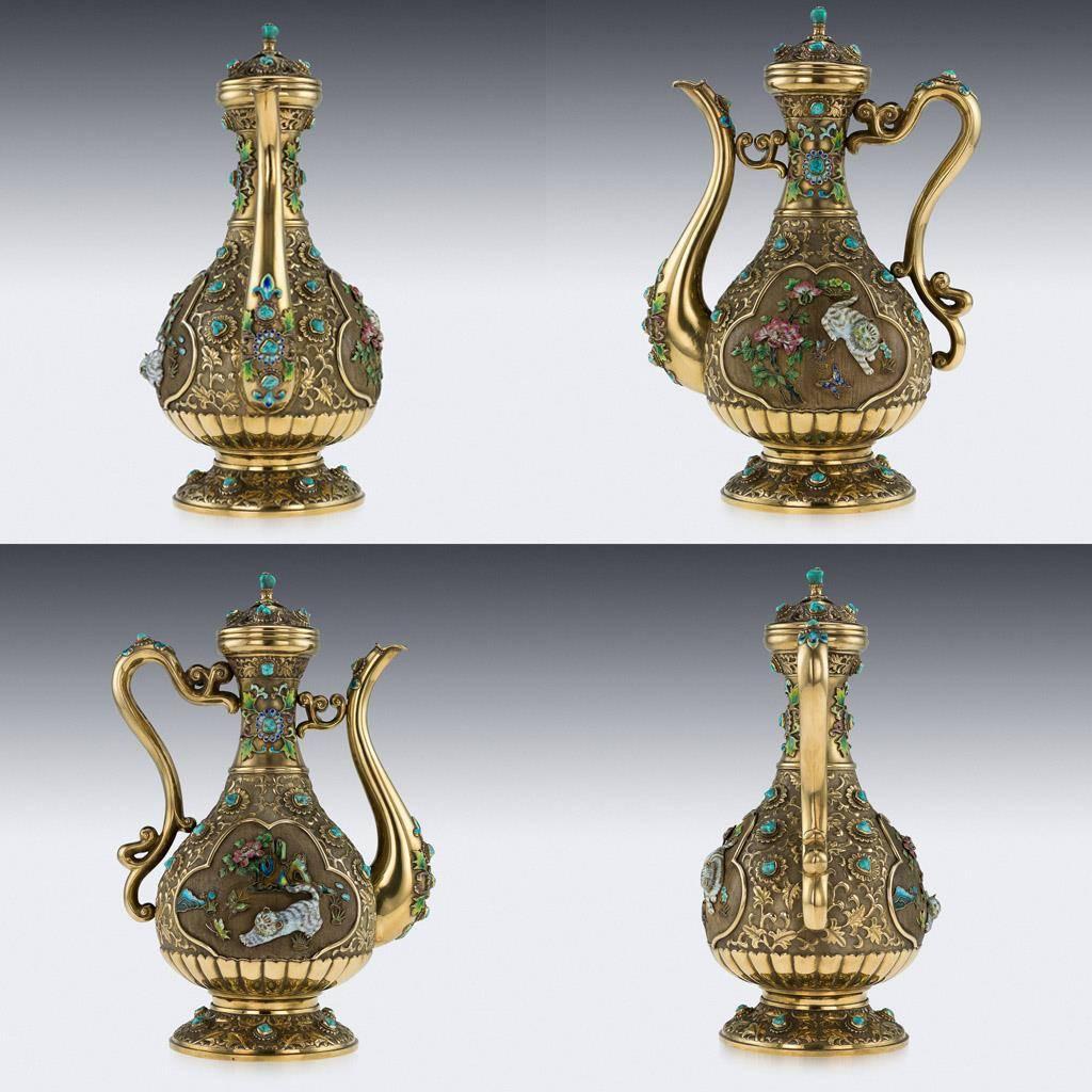 
Description

Exceptional 20th century magnificent Chinese solid silver gilt sake drinking set, comprising of a large ewer, eight goblets and a large tray. Each piece is richly gilt and extremely decorative, part-fluted and chased with scrolling