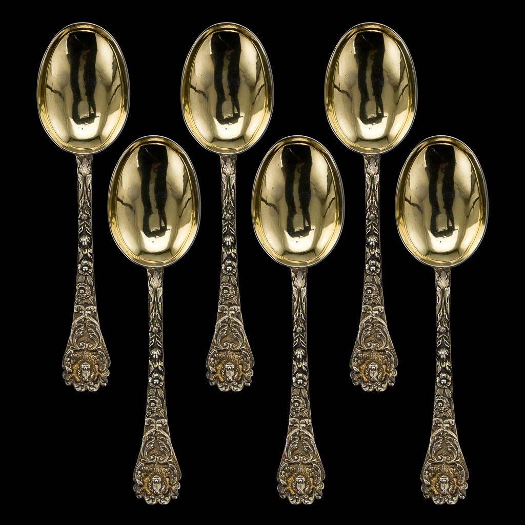 Antique 19th century rare set of six Victorian solid silver spoons, each richly gilt, each handle cast depicting angels, flowers and scrolls in relief. The set comes in the original presentation case by 