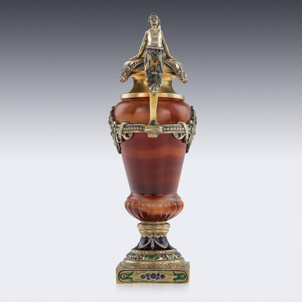 Antique 19th century Austrian Renaissance Revival solid silver enameled and gem-set figural agate vase, the baluster agate body supported by a square domed foot, beautifully champleve' enameled with a multicolored foliage and swag decoration, the