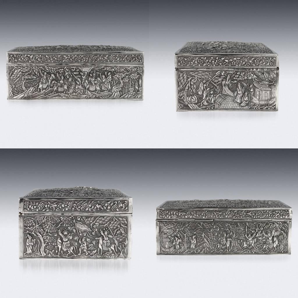 Antique 19th century rare Chinese solid silver large box, of rectangular form, decorated in repousse' high relief, on very finely tooled matted ground, depicting various figures in a landscape, including fighting warriors, dignitaries, attendants