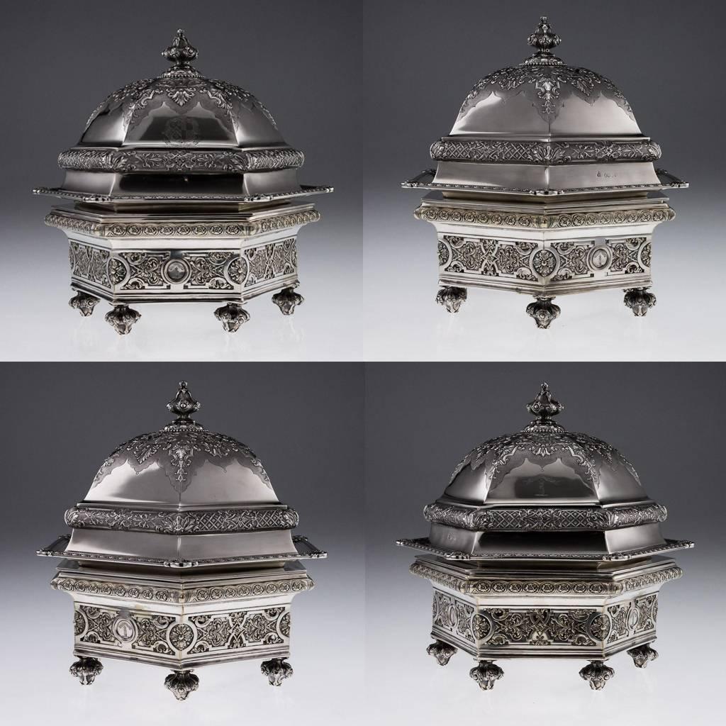 Antique 19th century rare and magnificent Victorian solid silver entree' dish and cover on stand, of shaped hexagonal form, the pierced frame on six reeded hexagonal feet, centring a burner.

As often the case for entree' dishes the stand is