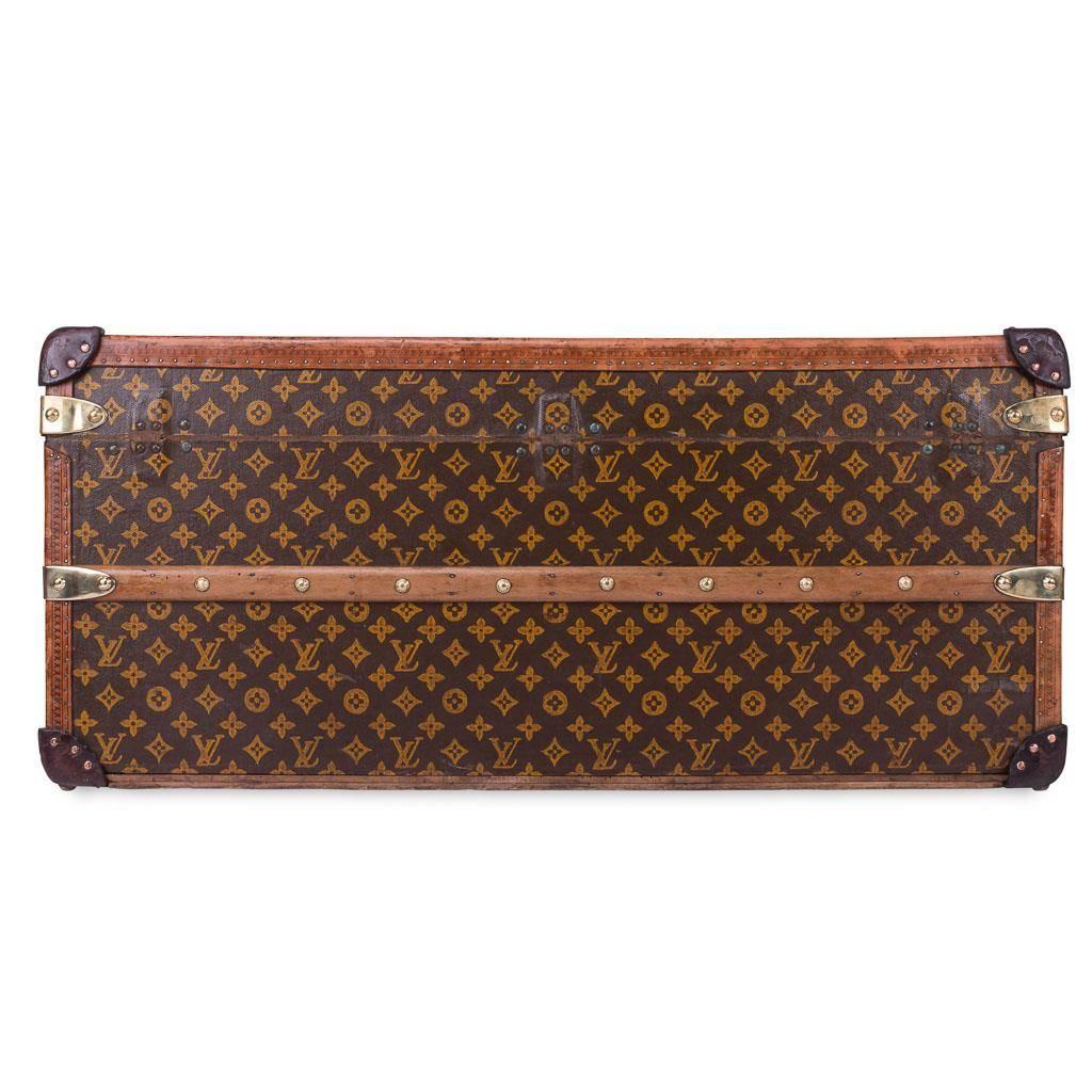 A wonderful petite Louis Vuitton trunk, particularly rare due to its height, 40cm, which always works so well as a coffee table or side table. The majority of trunks made by Vuitton were under 33cm high (cabin model) or over 50cm high (courier