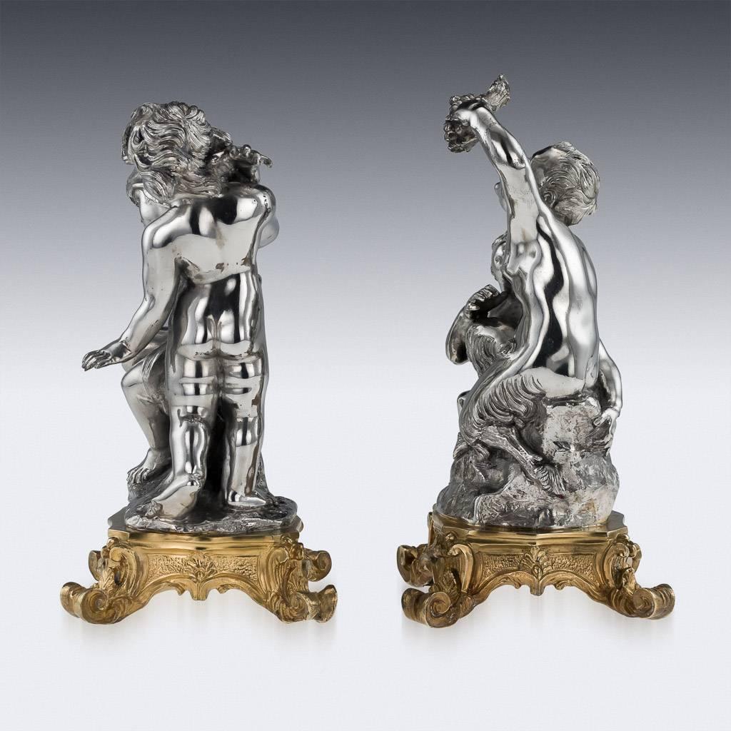 Antique 20th century Italian E.Avolio solid silver pair of sculptures with gilded Rococo bases, one representing two putti holding grapevine and the other representing one putti covered with a cloak. The quality of the sculptures is very fine, heavy