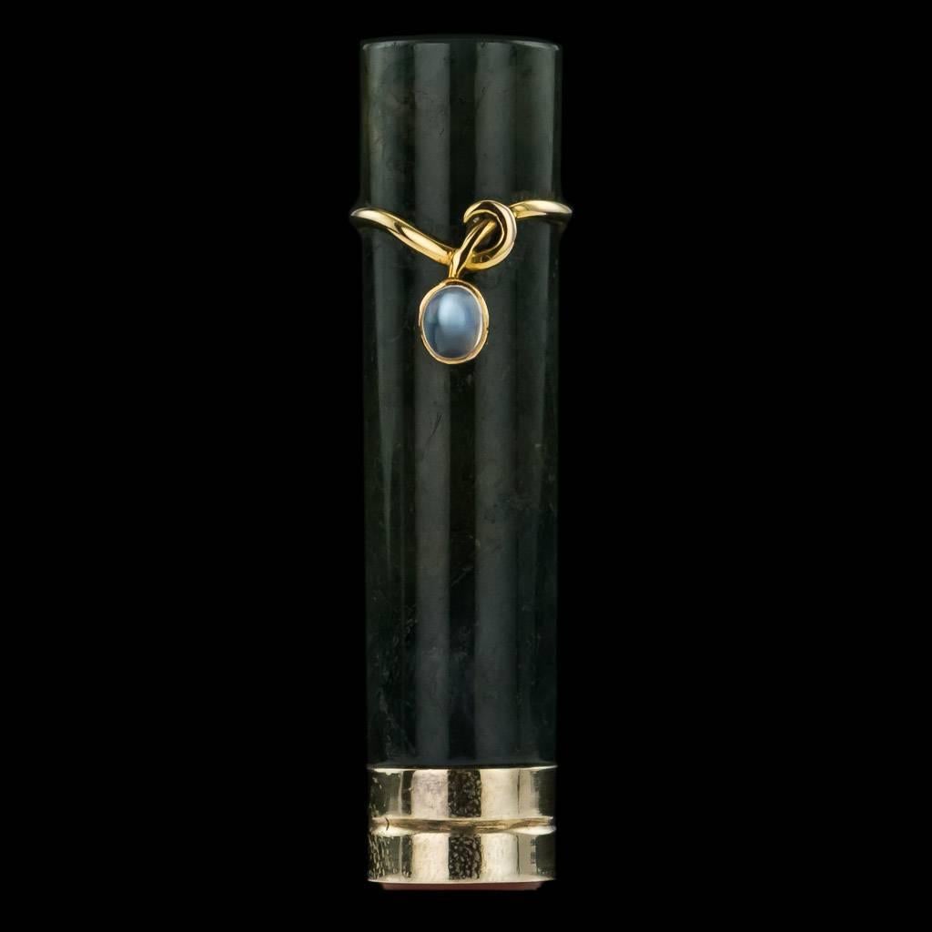 Antique 20th century Edwardian 18 karat gold hardstone mounted seal, made in the Faberge taste, the nephrite handle with gold mounts and applied with a moonstone cabochon, the seal base of the seal mounted with a carnelian in gold.

Apparently