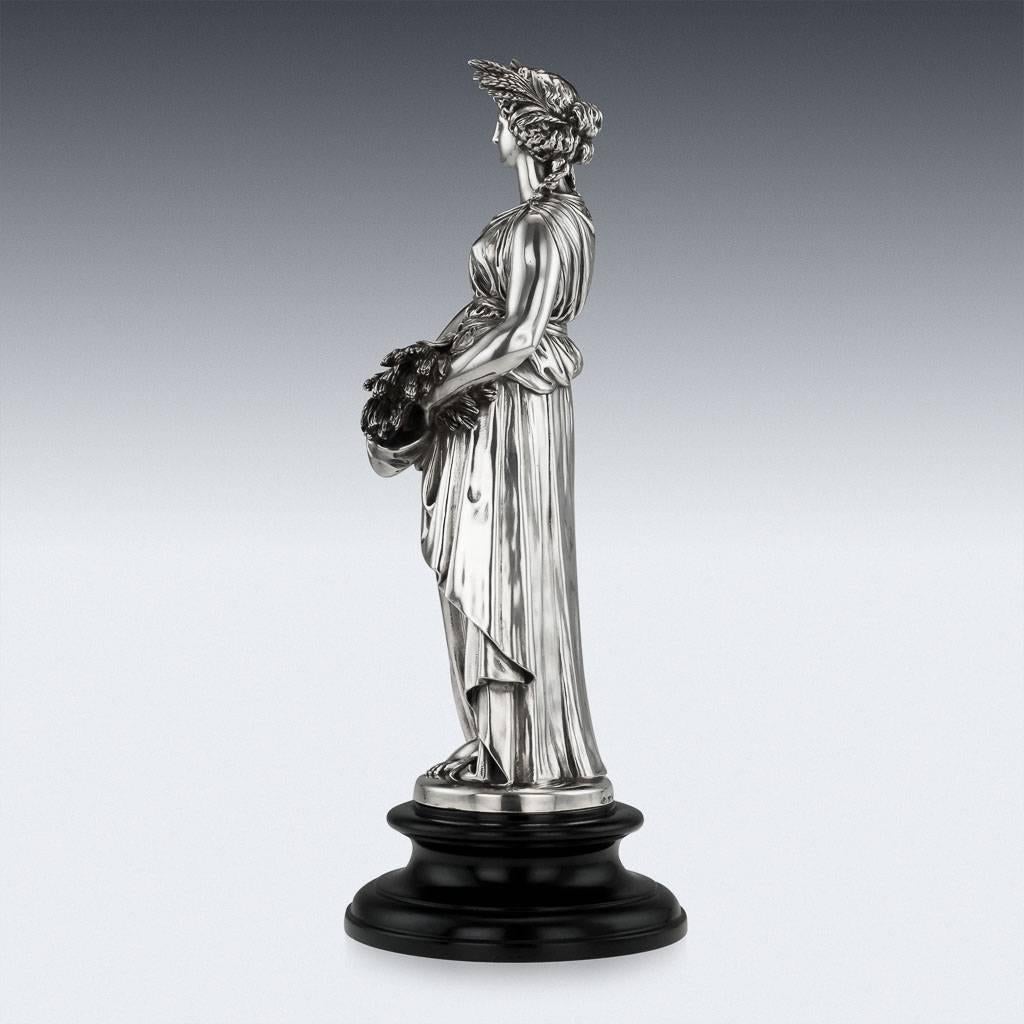 Description

Antique 19th Century French monumental solid silver prize statue, standing on on a turned ebonized base, the statue realistically modelled as a cast female figure, holding a harvested wheet and a wheat laurel in her hair, probably