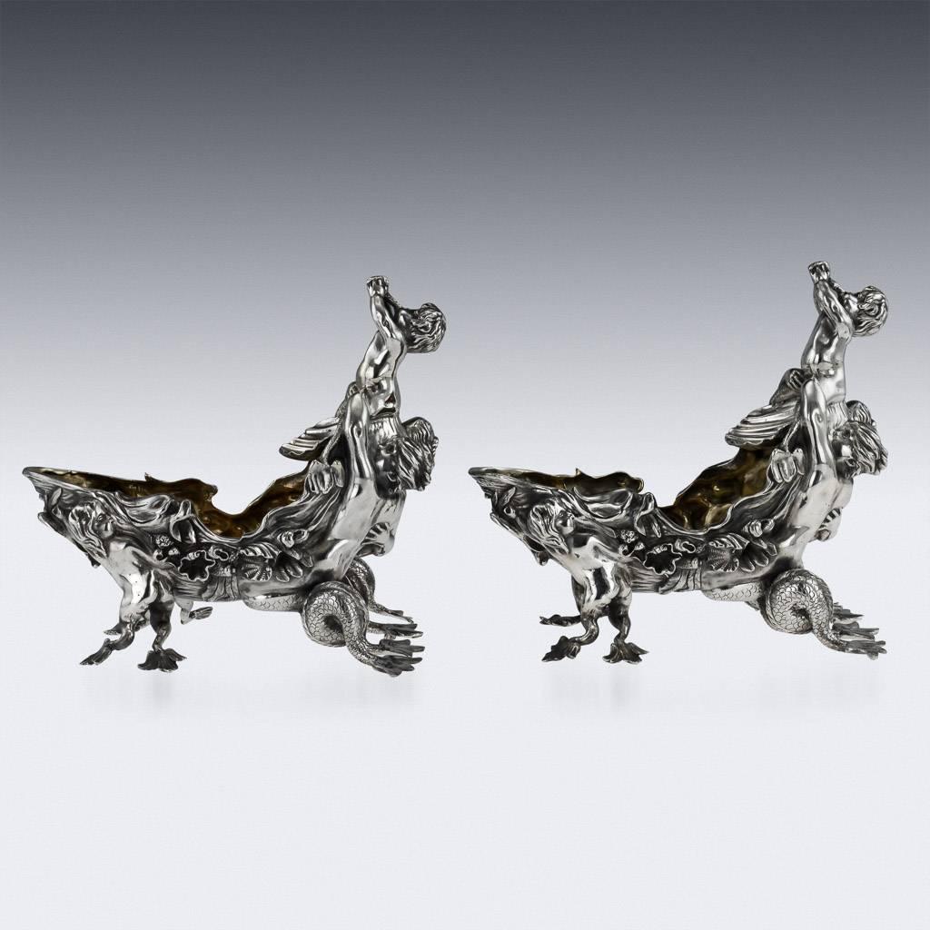 Description

Antique 19th century Victorian monumental solid silver pair of sauce boats, design greatly influenced by the 18th century Huguenot silversmiths such as Paul Lamerie and Lewis Mattayer, undoubtedly these sauce boats were made more for