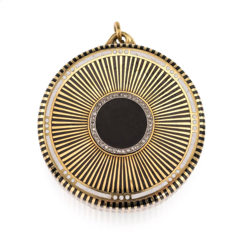 Antique 20th century French Cartier Art Deco 14-carat gold compact, of circular form, set with diamonds, the whole box is decorated with champleve' black enamel with sunburst gold motif to cover and back. The inside of the cover is set with a