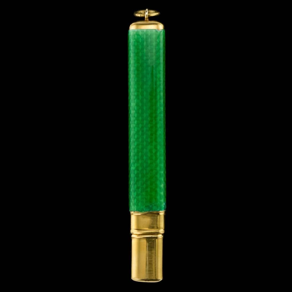 Antique early-20th century Imperial Russian Faberge silver-gilt and green guilloche enamel pencil holder, of flattened rectangular form, enameled in vibrant translucent green over a wavy guilloché ground. Both parts hallmarked Russian 88 silver (915