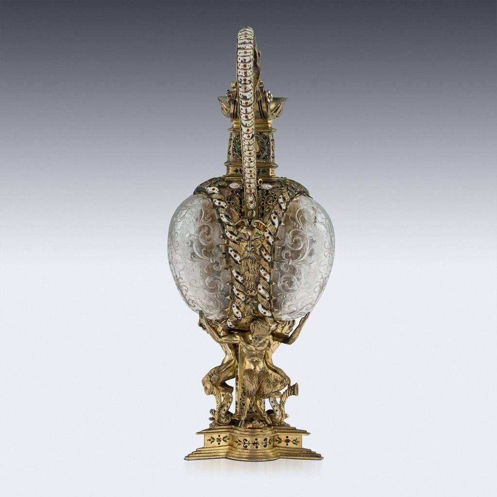 Antique 19th century Austrian exceptional solid silver gilt, enamel, rock crystal, gem set ewer. Made in the style of David Altenstetter, with three intricately hand-carved rock crystal panels, mounted in chased gilt mounts, vari-color enamels and