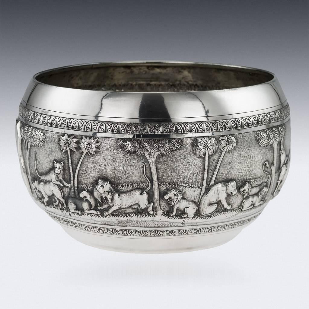 Antique early-20th century Indian solid silver bowl, repousse' decorated with a detailed and very crisp hunting scenes. Hallmarked on the base A. Bhicajee & Co, Bombay, silver (900 standard), Bombay style combines design elements from; Cutch, Burma,