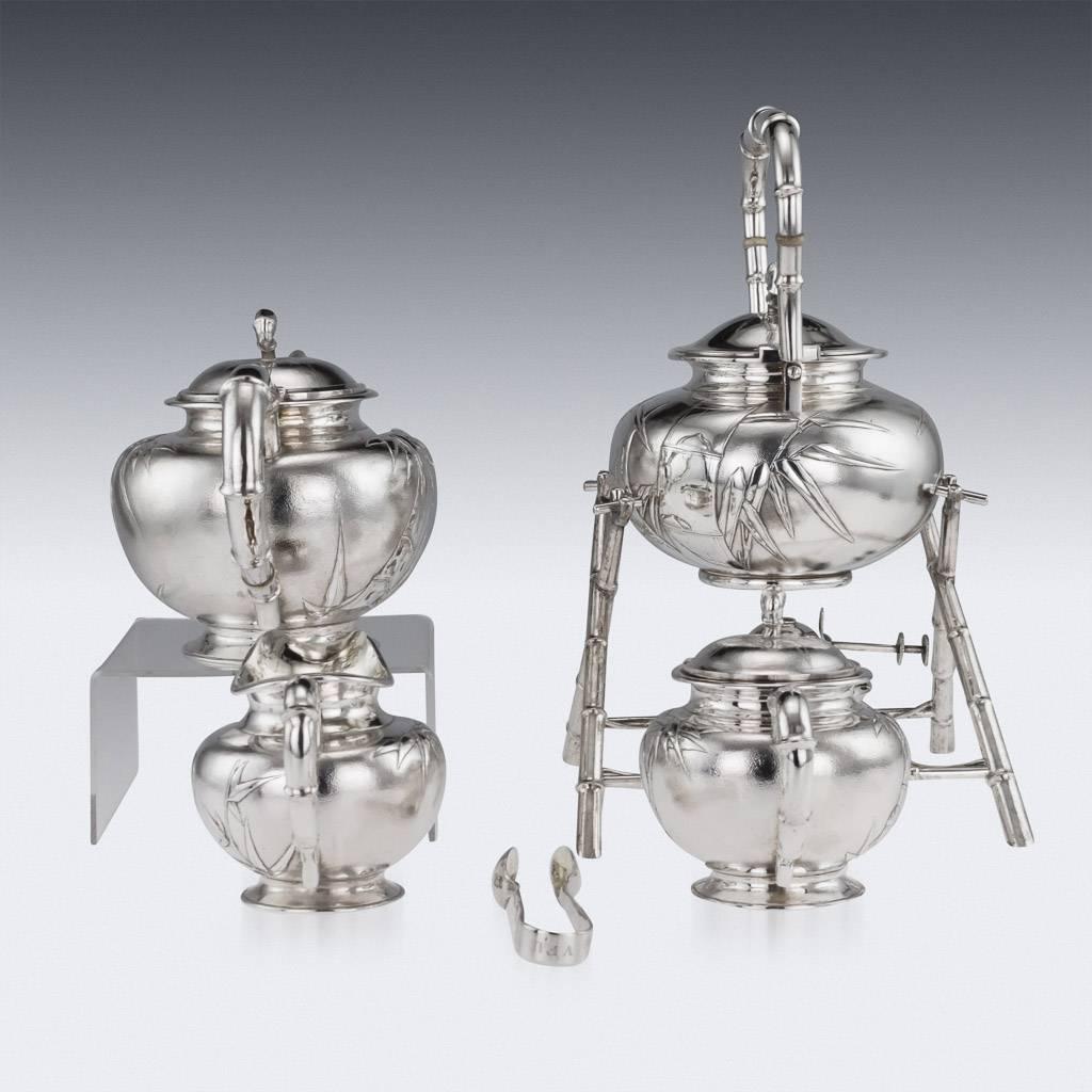 Antique early-20th century rare Chinese export solid silver impressively large, five-piece tea set, comprising of a hot water kettle on stand, teapot, covered sugar bowl, milk jug and sugar tongs, each body is embossed with a lovely bamboo-leaf