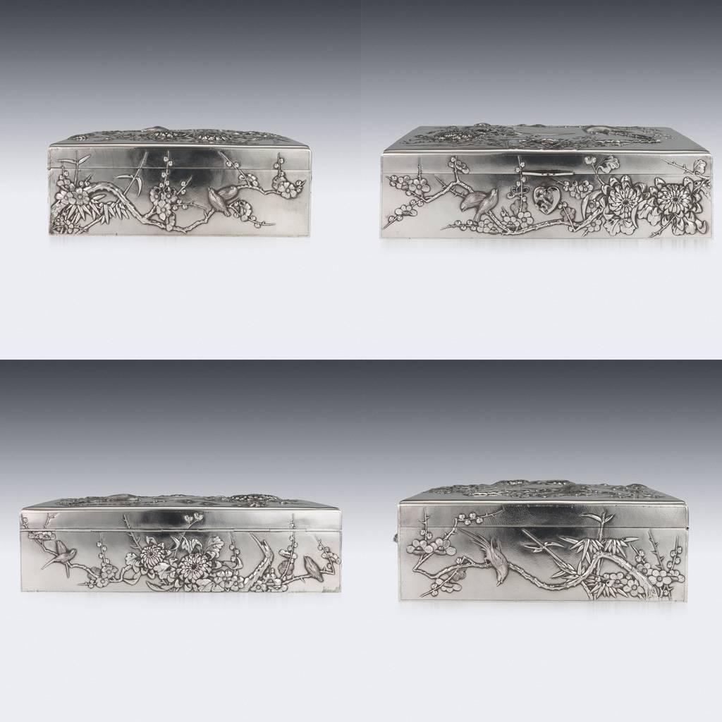 DESCRIPTION
Antique 19th Century rare Chinese solid silver large decorative jewellery box, of rectangular form, decorated in repousse' high relief, on very finely tooled matted ground, depicting birds perched on blossoming cherry trees and