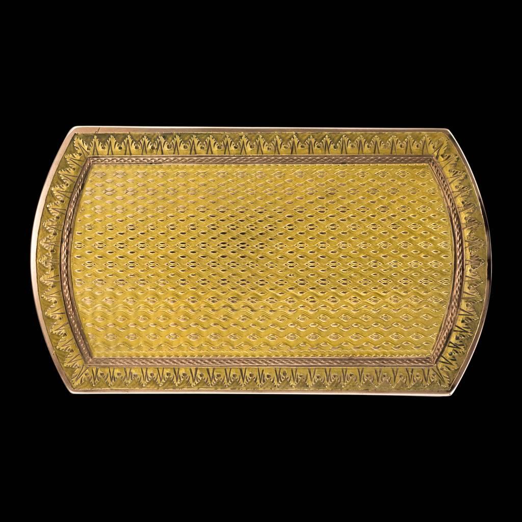 Antique 19th century French 18 karat two-color solid gold snuff box, of rectangular cushion shape, the hinged engine turned covers beautifully engraved with acanthus leaf around the edges. Hallmarked French gold (750 standard), the box dates to the