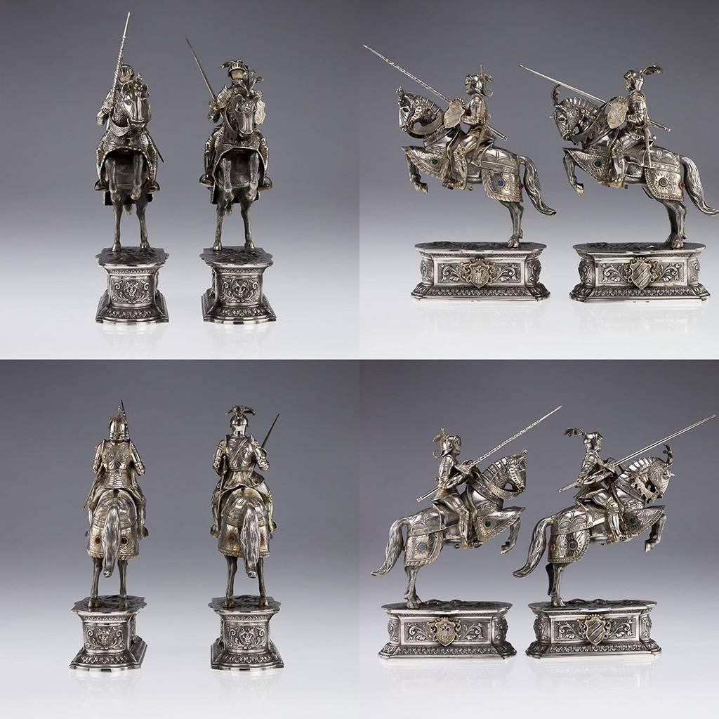 Antique early-20th Century pair of German Solid Silver figures, each modeled as a jousting knight on horseback, both holding detachable spear and shield, impressively large and very naturalistically well-refined, horse and rider clad in armor with