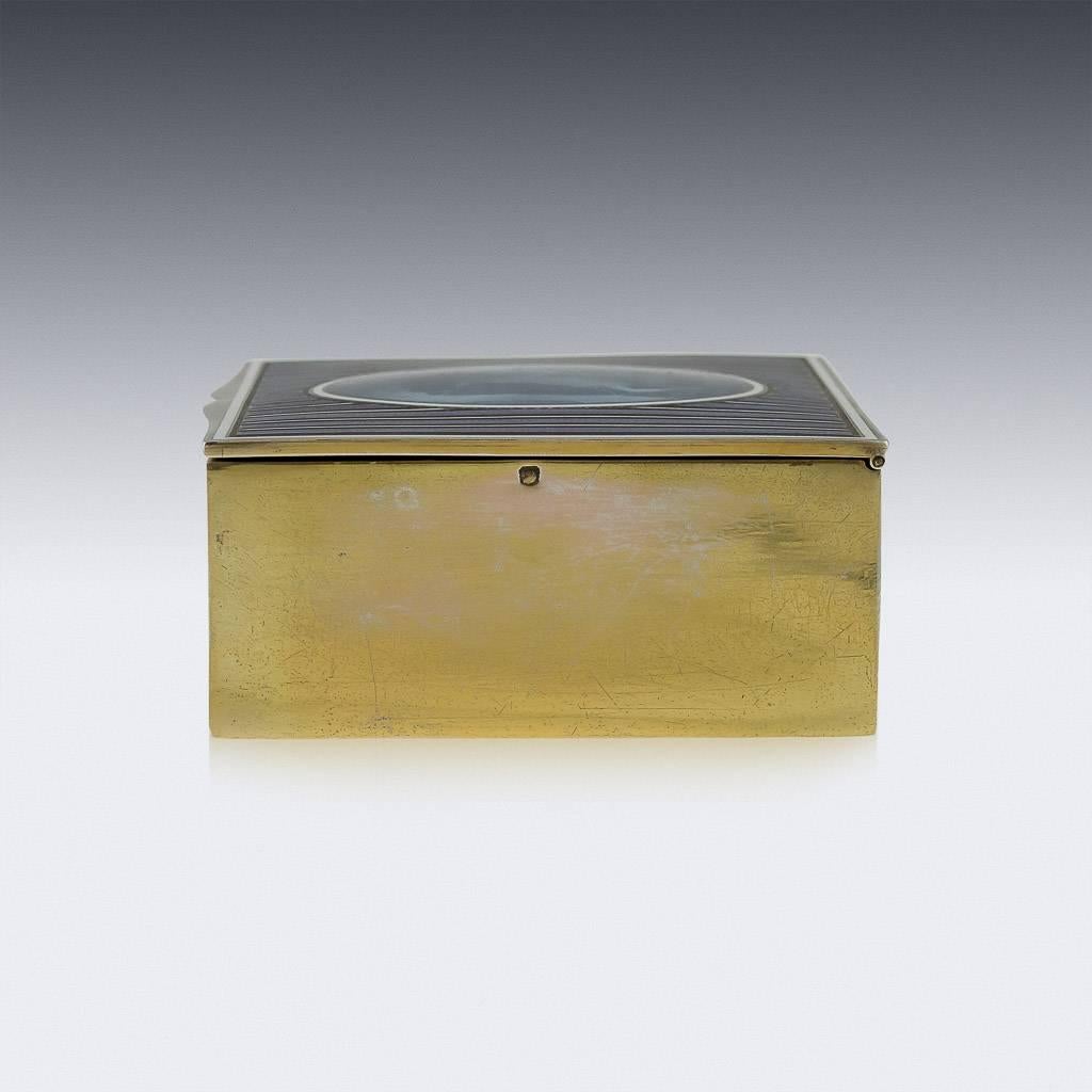 Antique 20th century French solid silver and hand-painted enamel jewelry or cigarette box, of plain rectangular form, body gilded and hinged cover applied with enamel bands and central plaque has an exceptionally well-painted Romantic scene: a lady