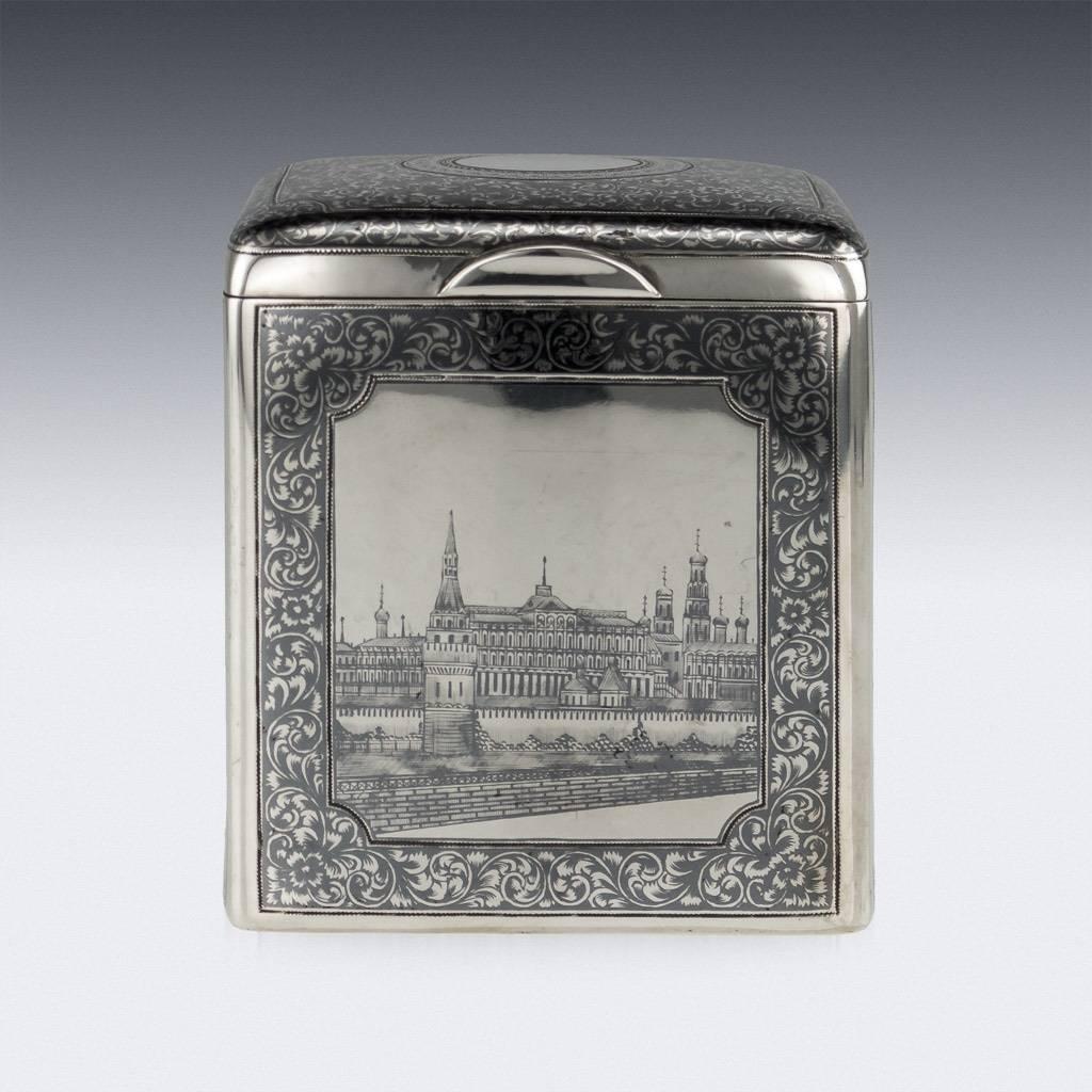 Description
Antique 19th century Imperial Russian solid silver and niello large tea caddy, parcel gilt, of square form, each side with a niello decoration depicting famous Moscow landmarks, the sides borders and domed lid chased with ivy foliate