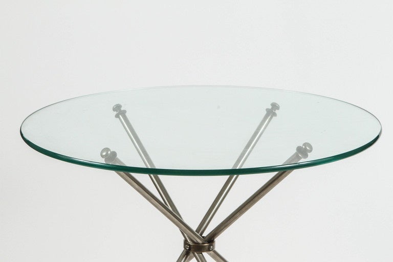Collapsable campaign style side table in matte steel with removable glass top