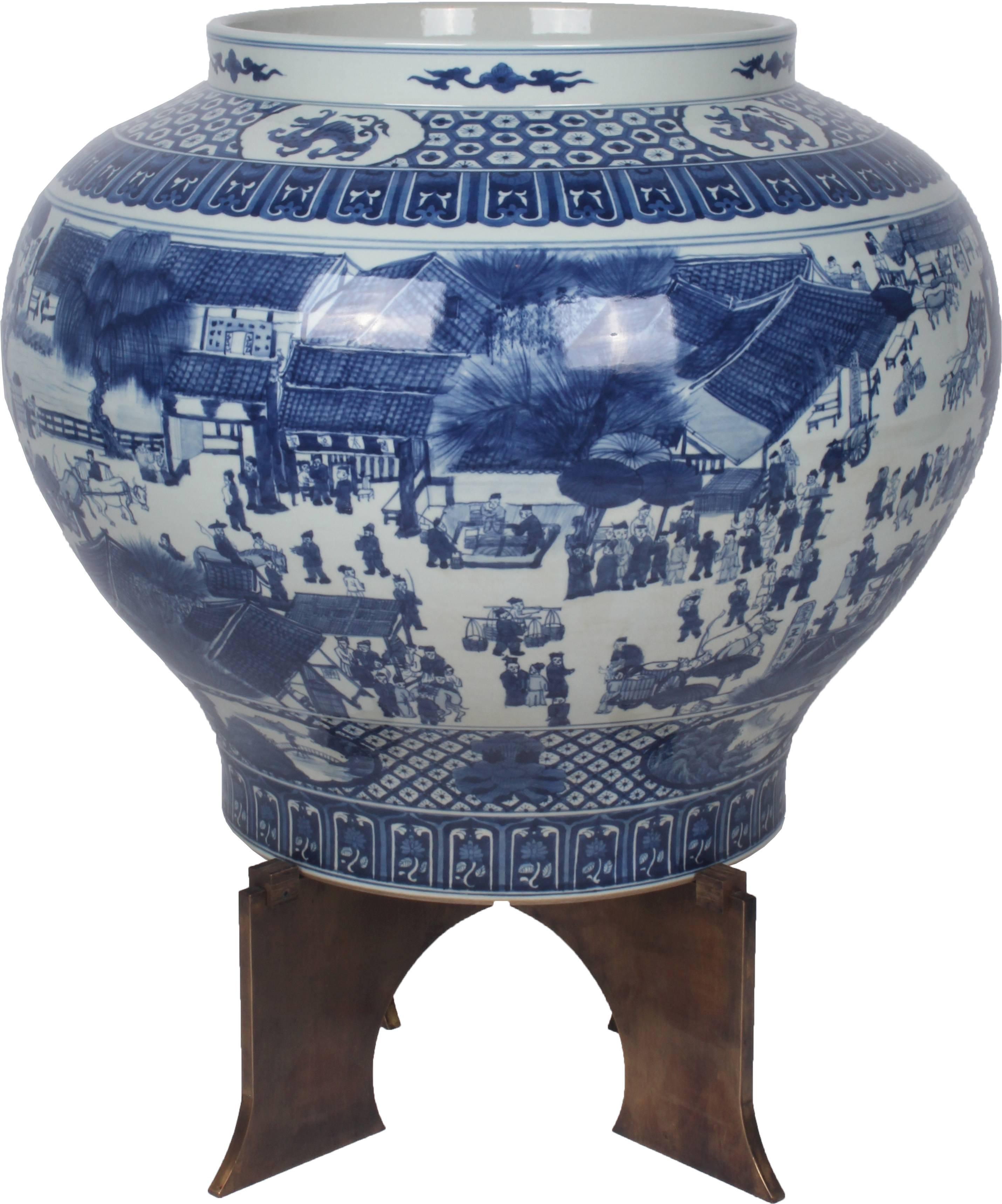 Beautiful hand-painted blue and white urn, circa 1940 with custom bronze base.