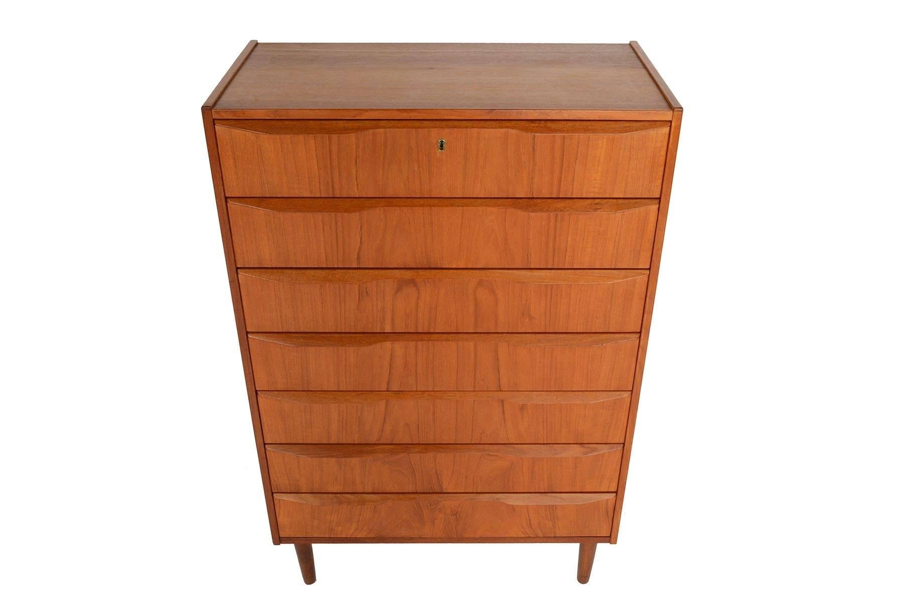 This gorgeous Danish modern seven-drawer midcentury teak highboy dresser by Tibergaard of Denmark is a rare find. Rich woodgrain and high quality construction define this classic piece. In excellent original condition.
 

      