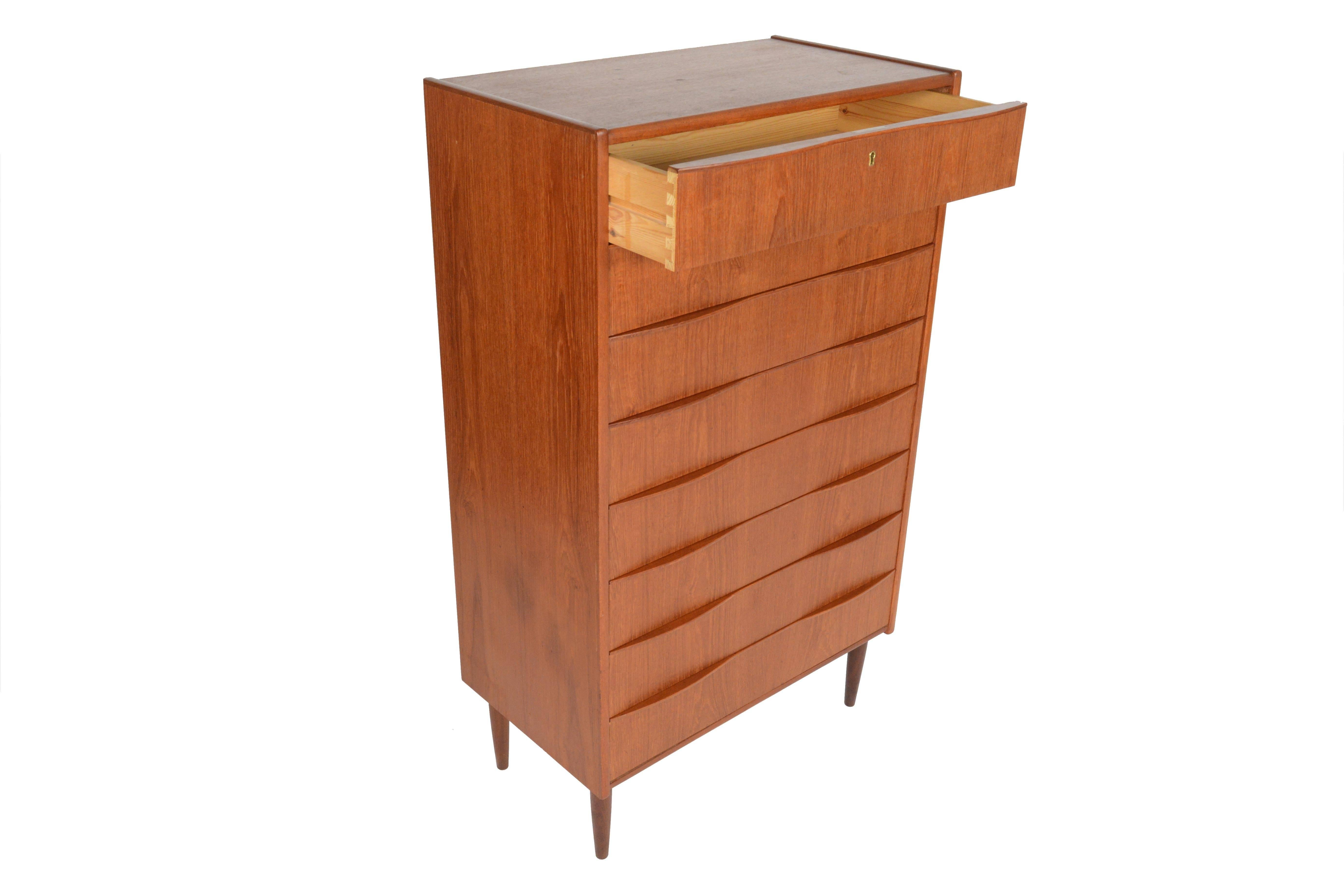 Mid-20th Century Danish Modern Midcentury Eight-Drawer Wave Pull Teak Highboy Dresser