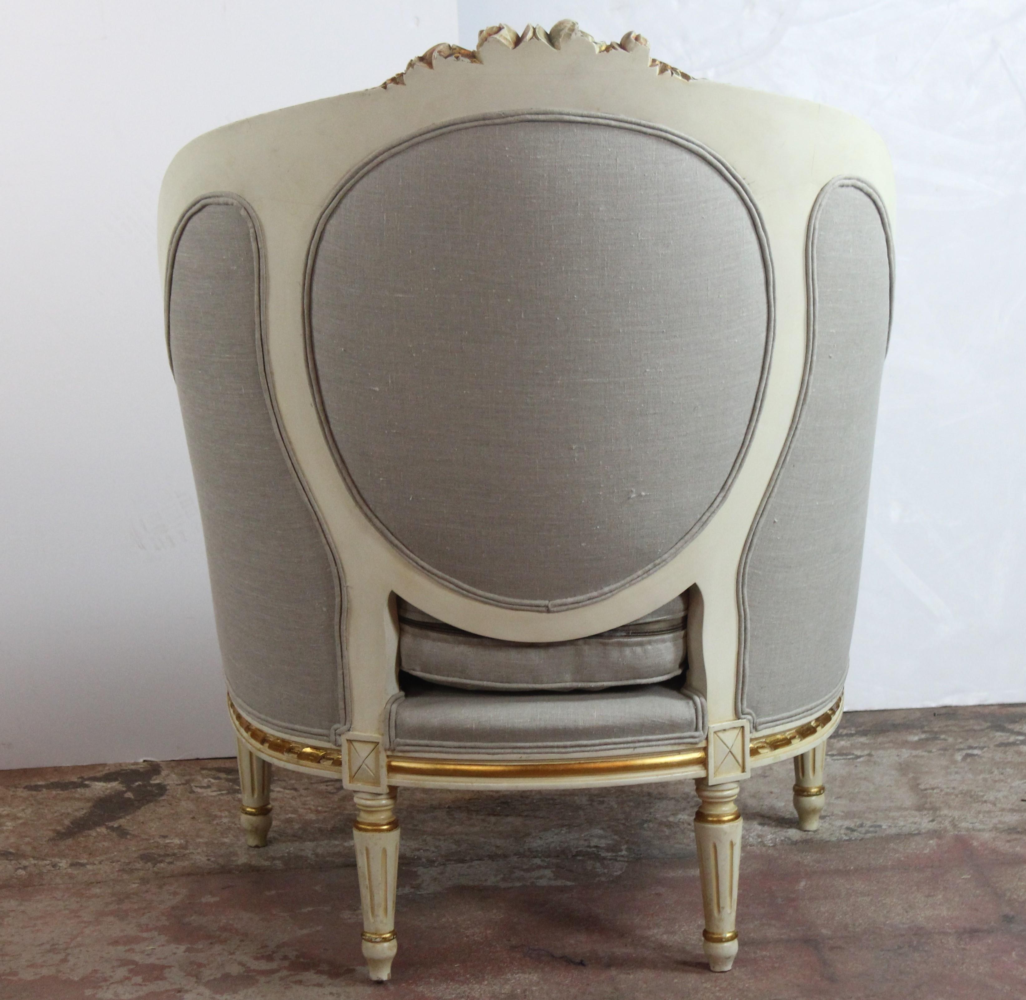 Louis XVI style barrel back chairs wood carved with gold accents. Upholstered linen.