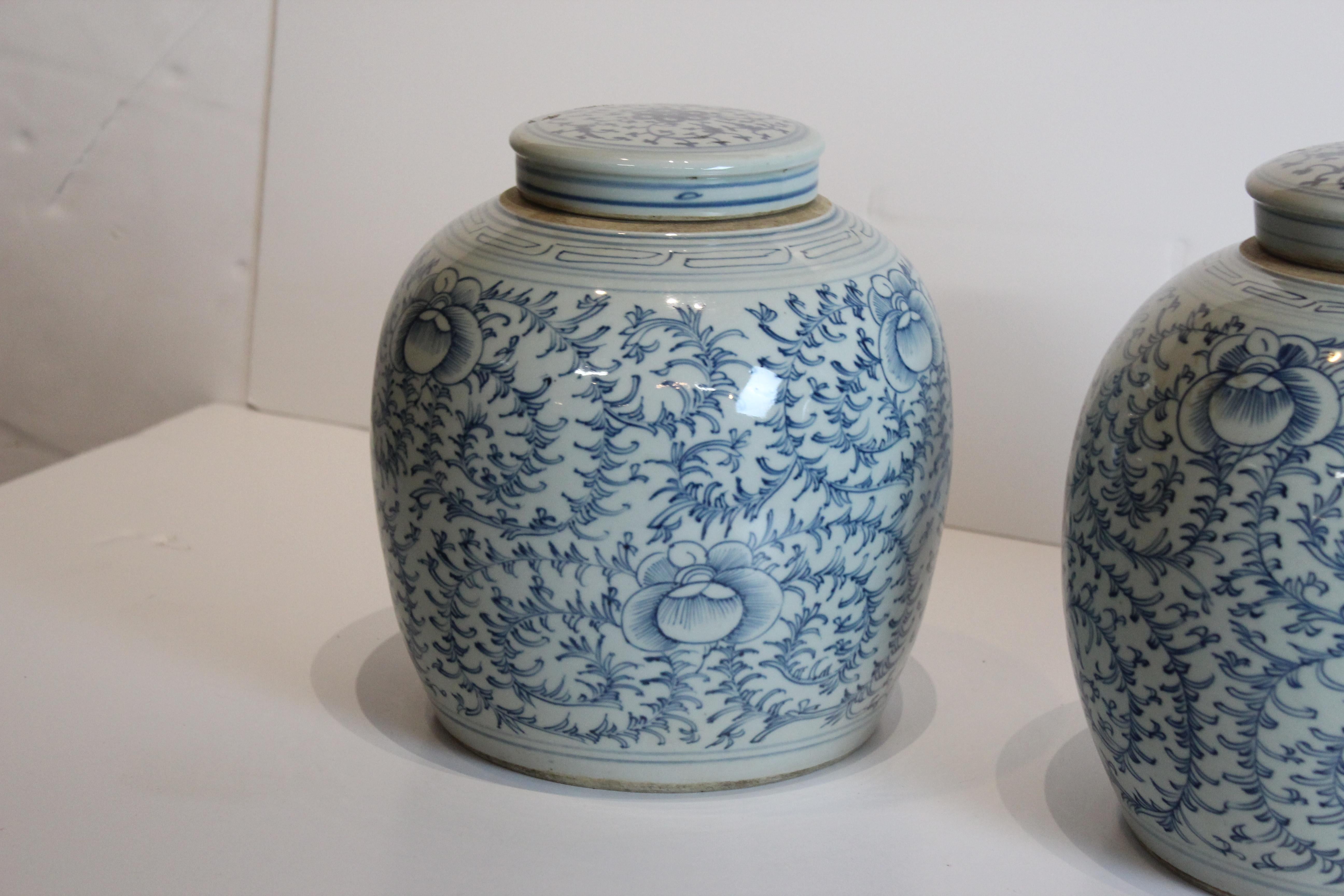Hand painted Asian blue and white ginger jars.