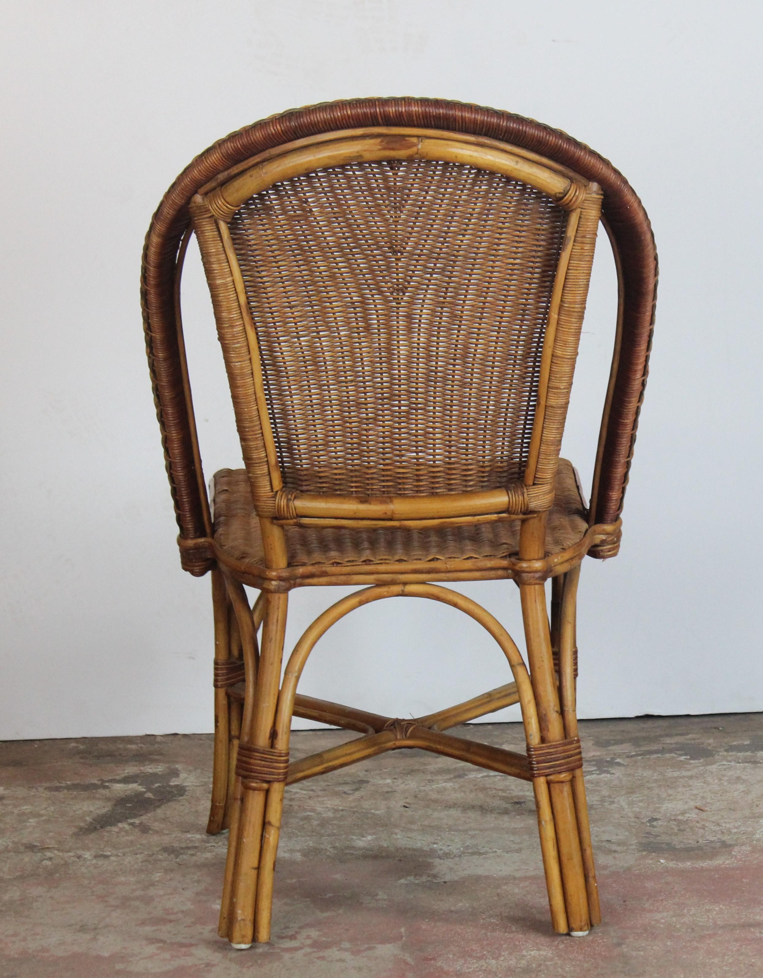 Set of four round back rattan chairs. Very comfortable, deep back and wide back.