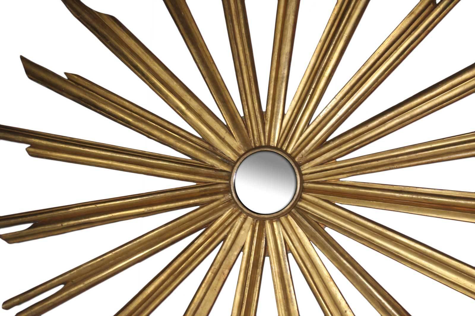 1920s, French wood carved oversize gold leaf sunburst mirror.