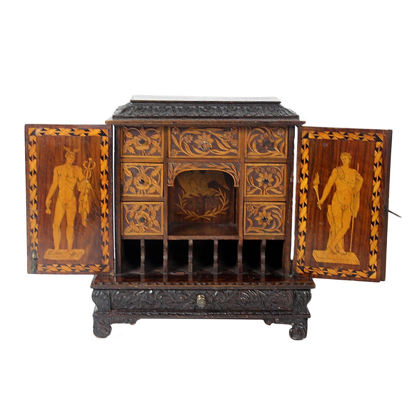 Miniature two-door marquetry cabinet or jewelry with classical figures, circa 1815.