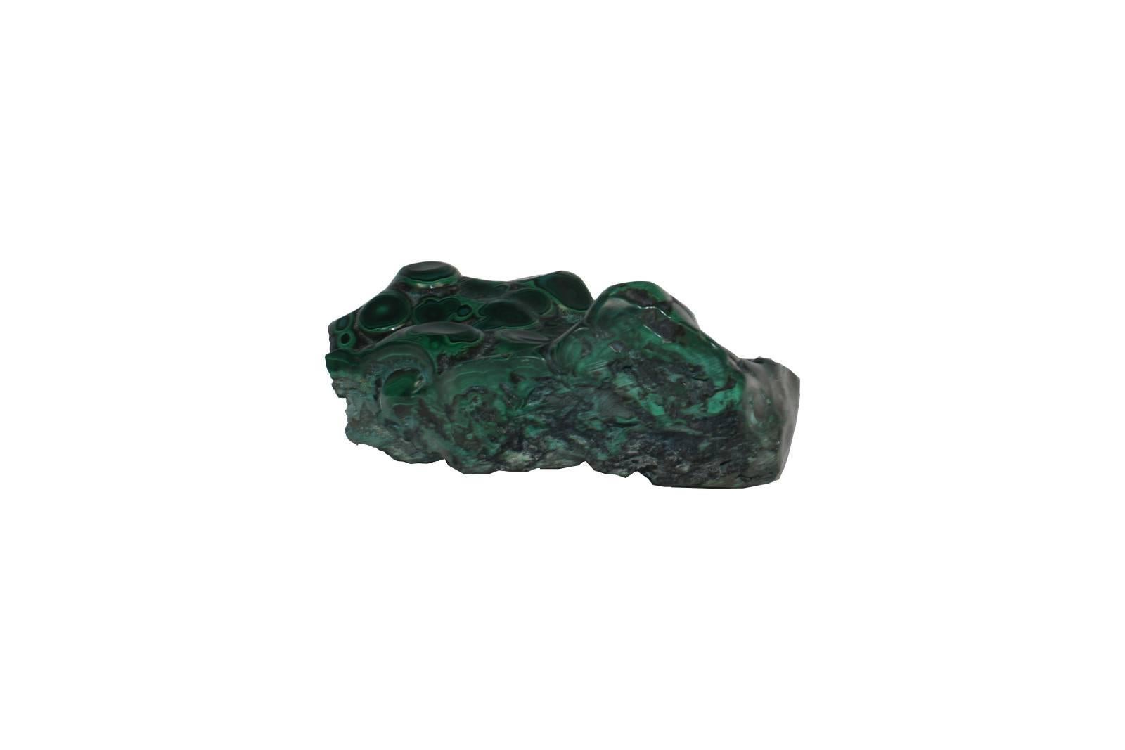 Vibrant specimen of green-banded Malachite showing the unique pattern of the mineral structure.